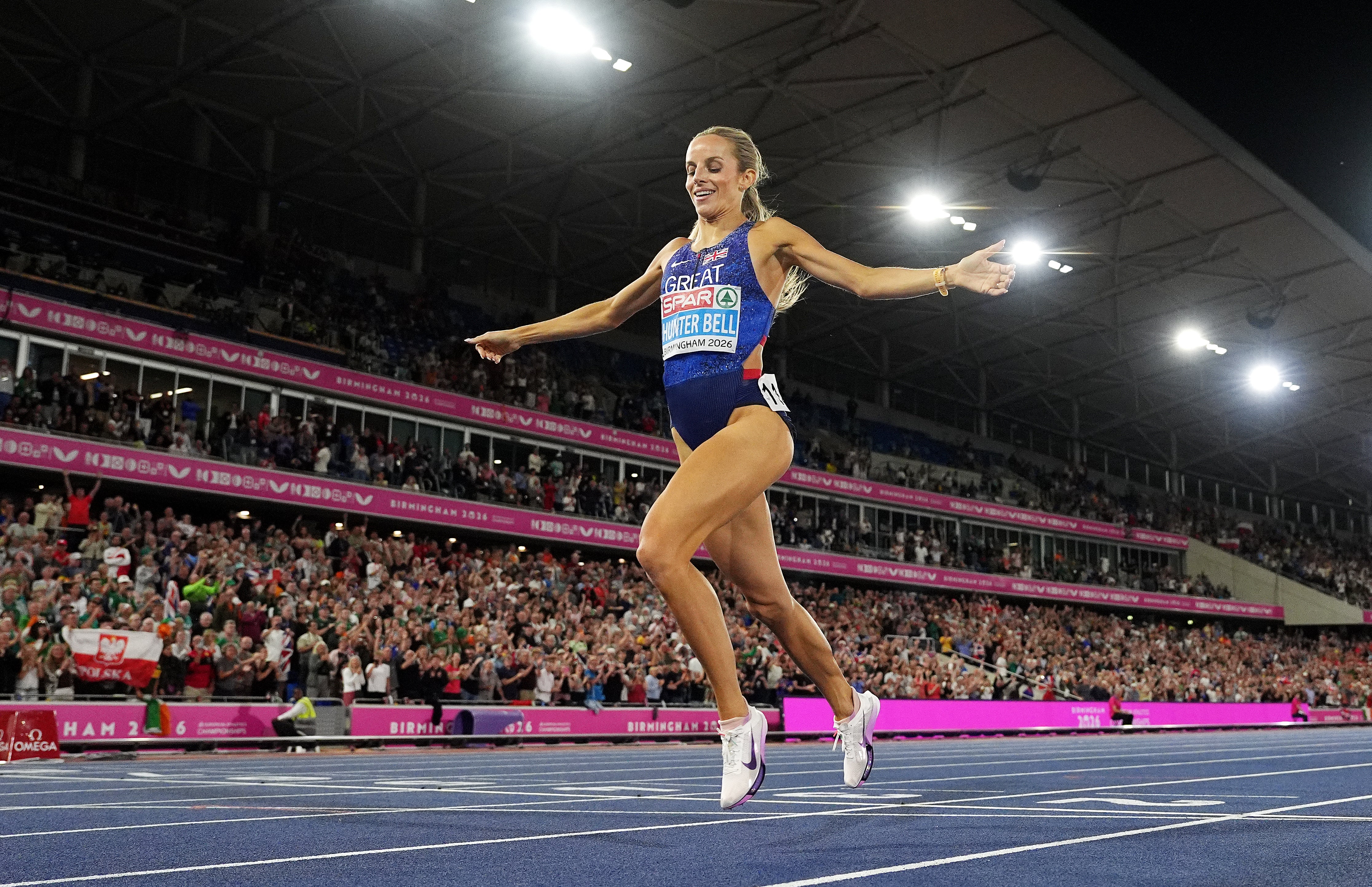 Georgia Hunter Bell crosses the line to win gold in the 1500m (Martin Rickett/PA)