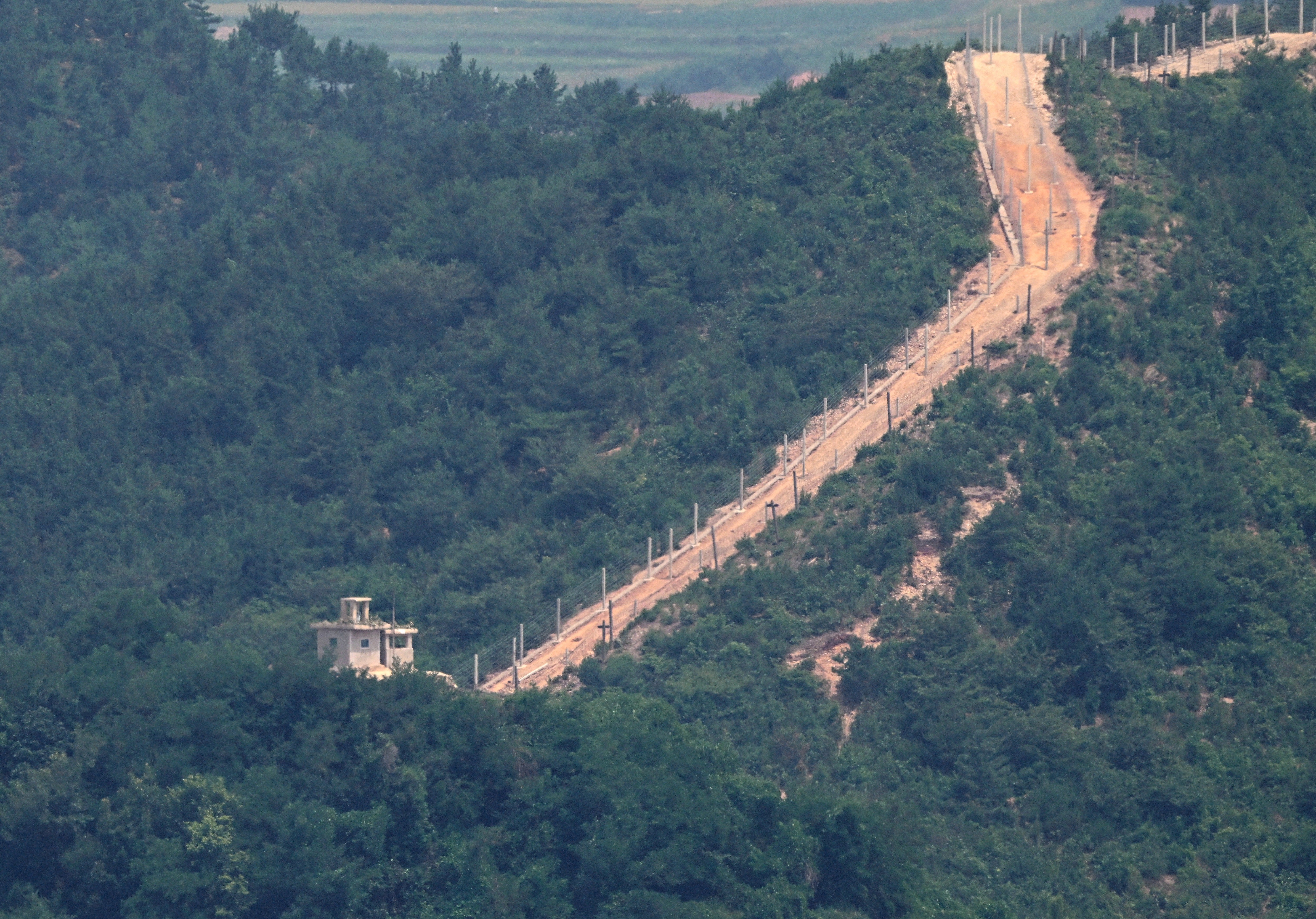 A North Korean guard post and military fences in the demilitarised zone along the border with South Korea