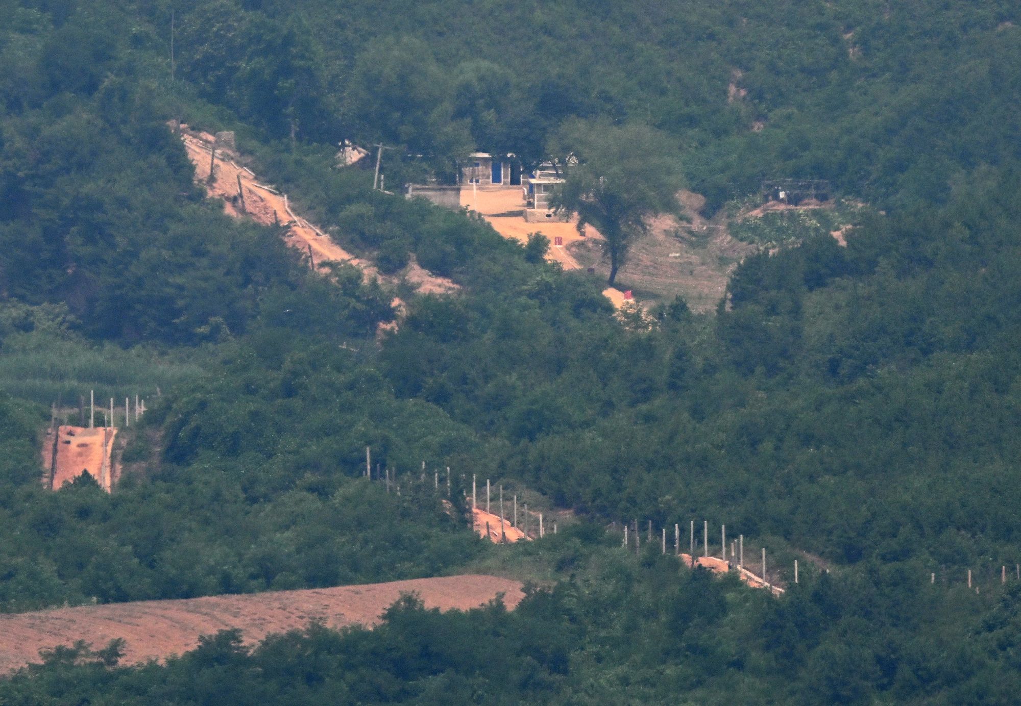 A North Korean guard post and military fences in Gaepung country
