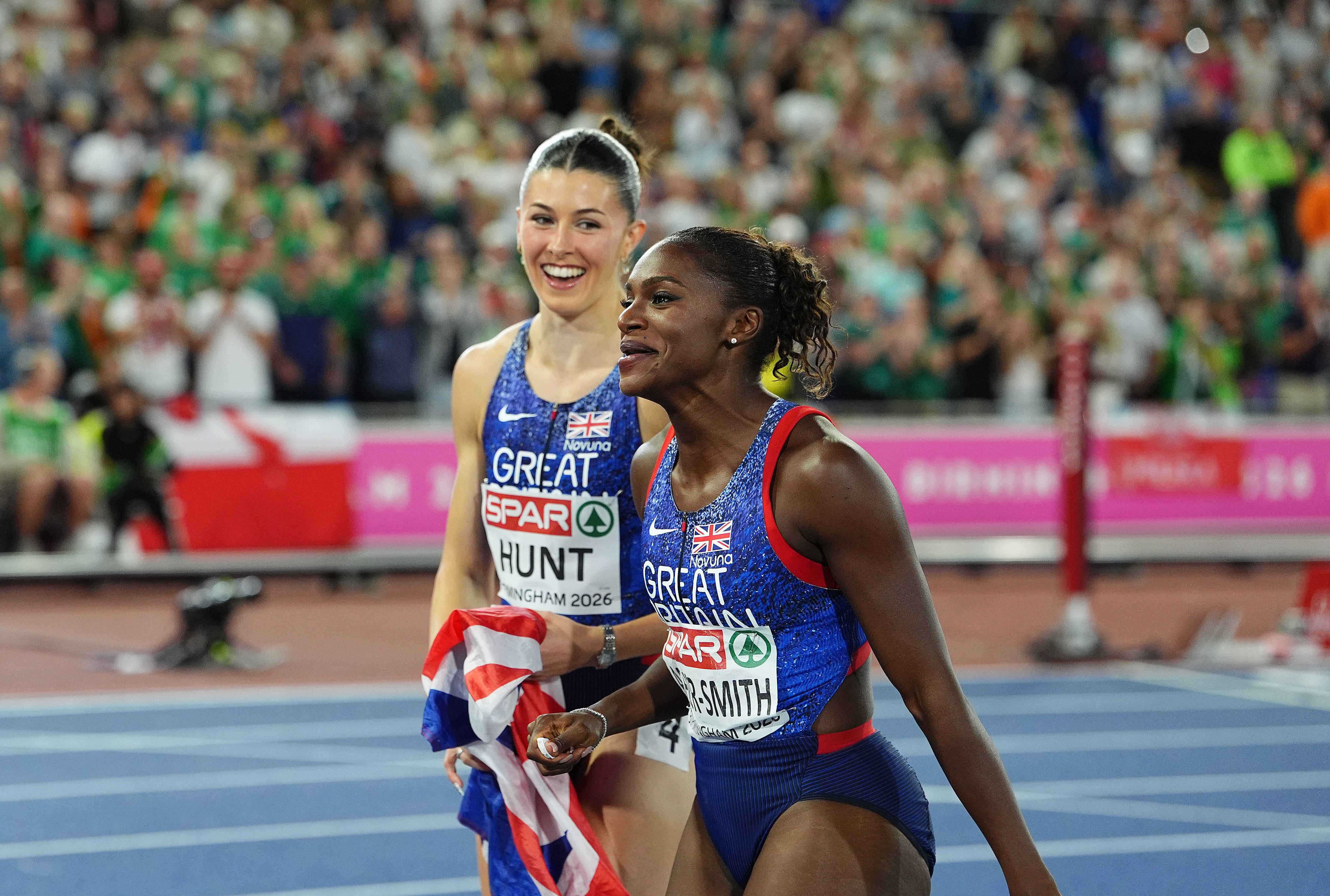 Dina Asher-Smith (right) celebrates her 11th European Championship medal (Martin Rickett/PA)