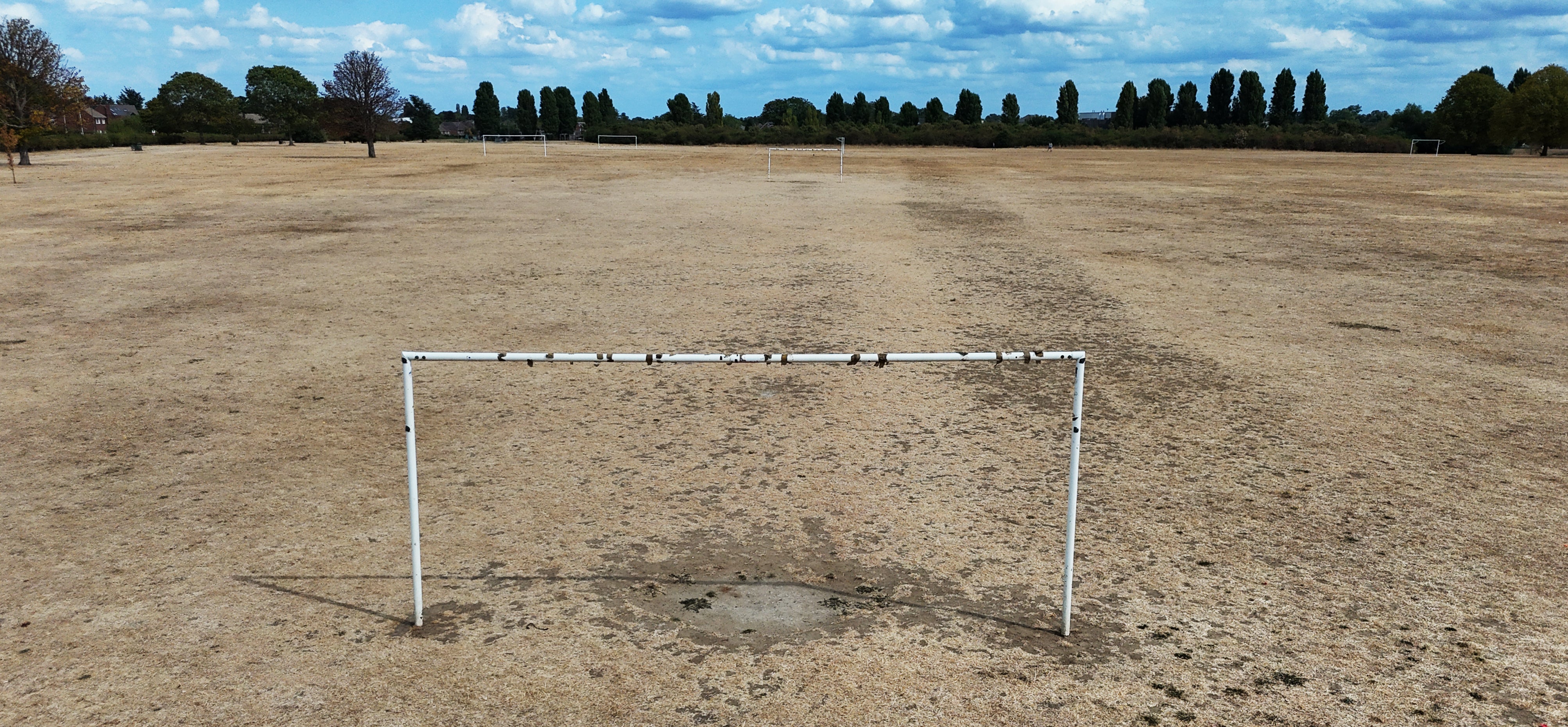 Desiccated football pitches and playing fields in Slough, Berkshire (Jonathan Brady/PA)