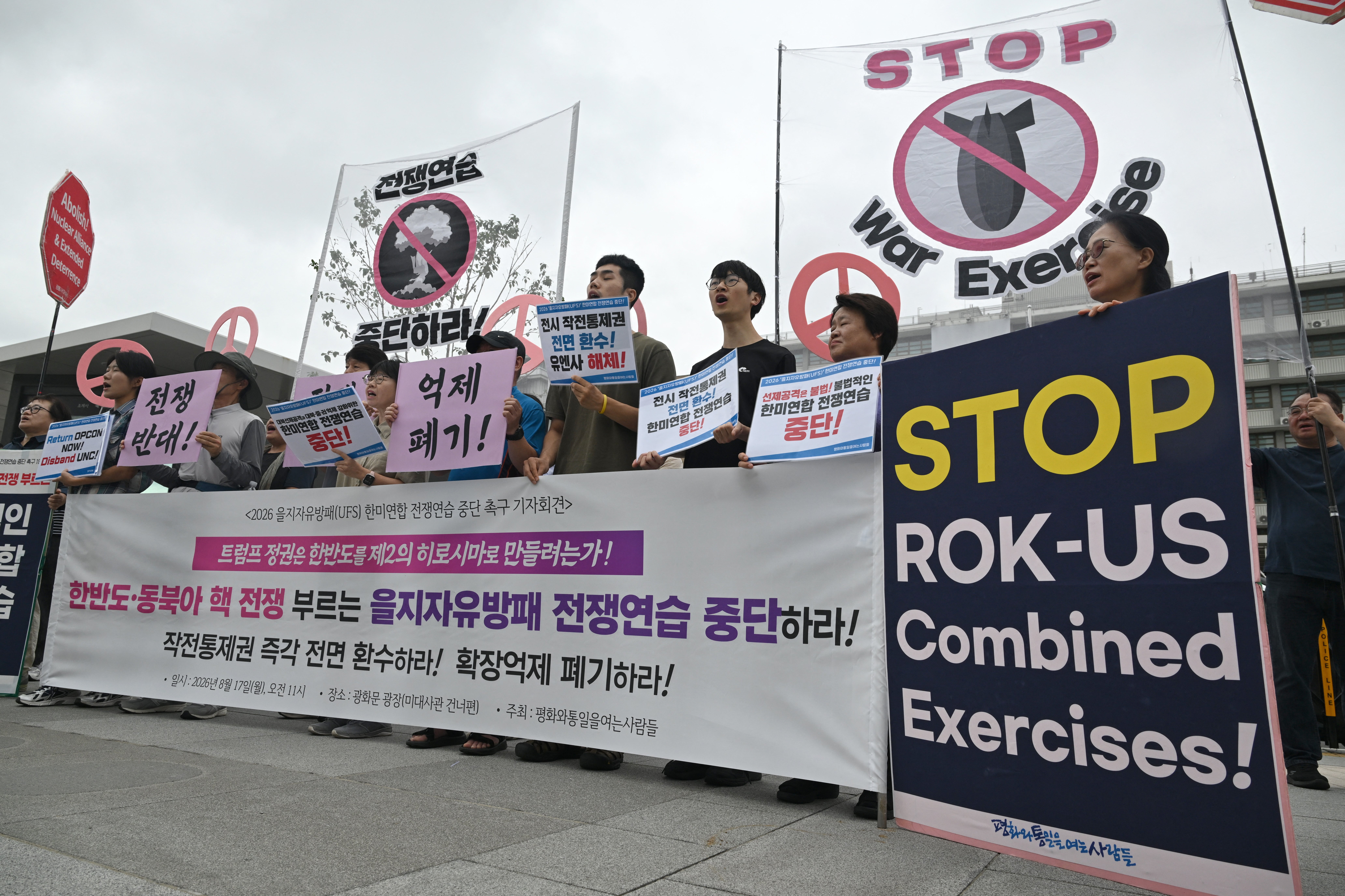 South Korean protesters hold placards as they attend a rally to oppose the joint military exercise between South Korea and the US named Ulchi Freedom Shield (AFP/Getty)