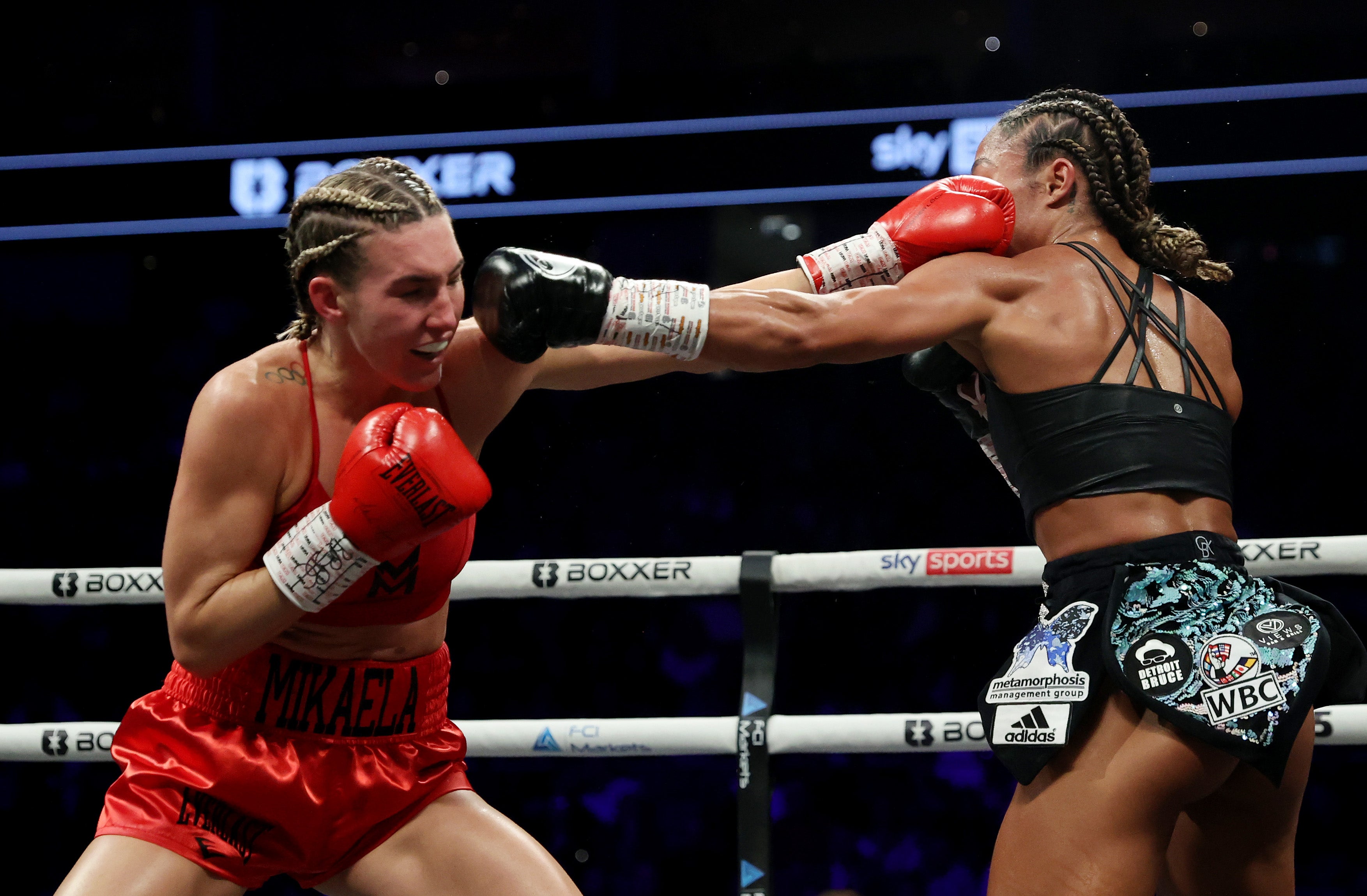 Mikaela Mayer (left) has lost two razor-close decisions but has otherwise been stellar as a pro