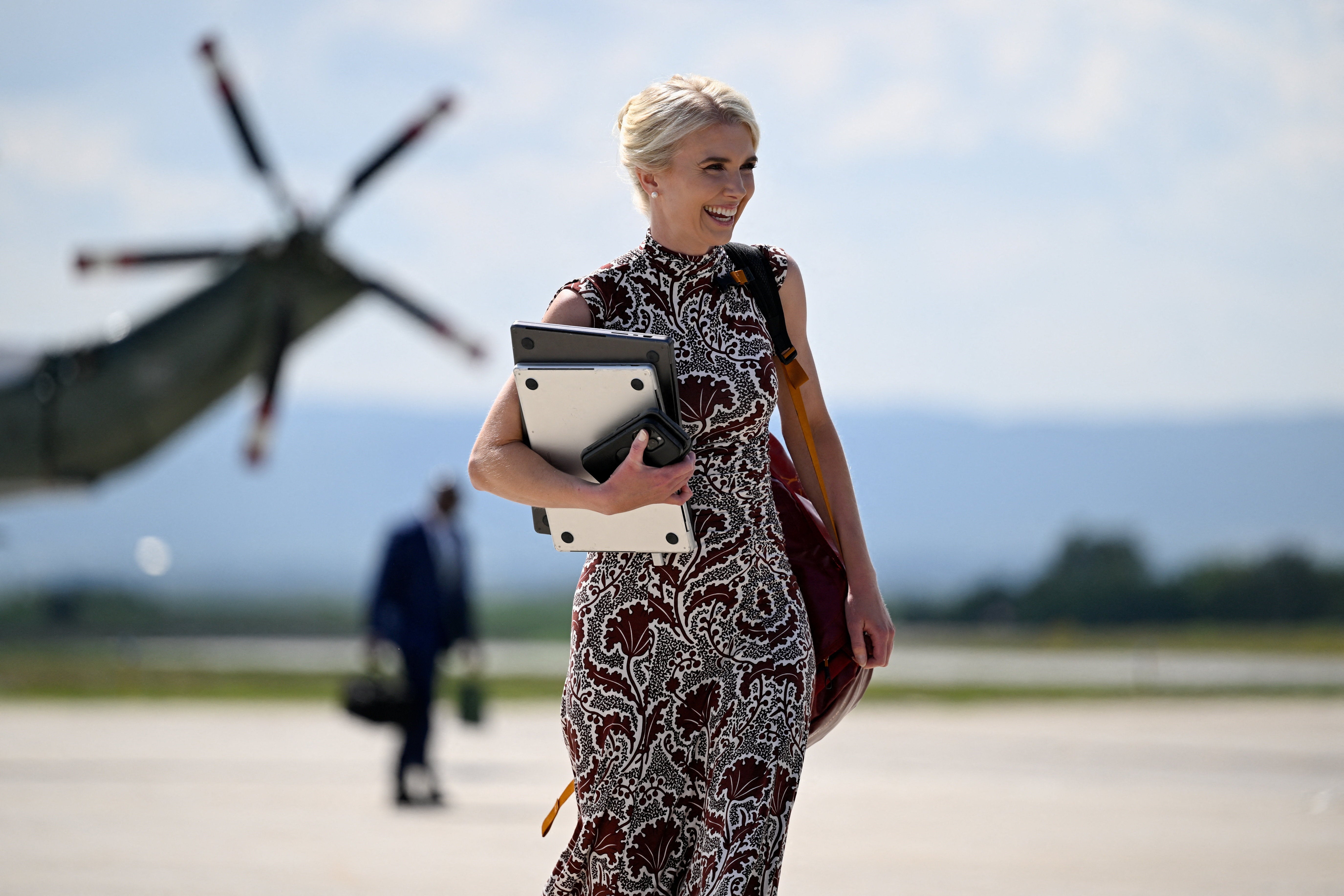 Harp’s nickname ‘the human printer’ stems from her job to print out physical copies of social media posts, articles, op-eds and messages for President Trump to review. One New York Times report alleged Harp carried a portable printer around to do so at any given time
