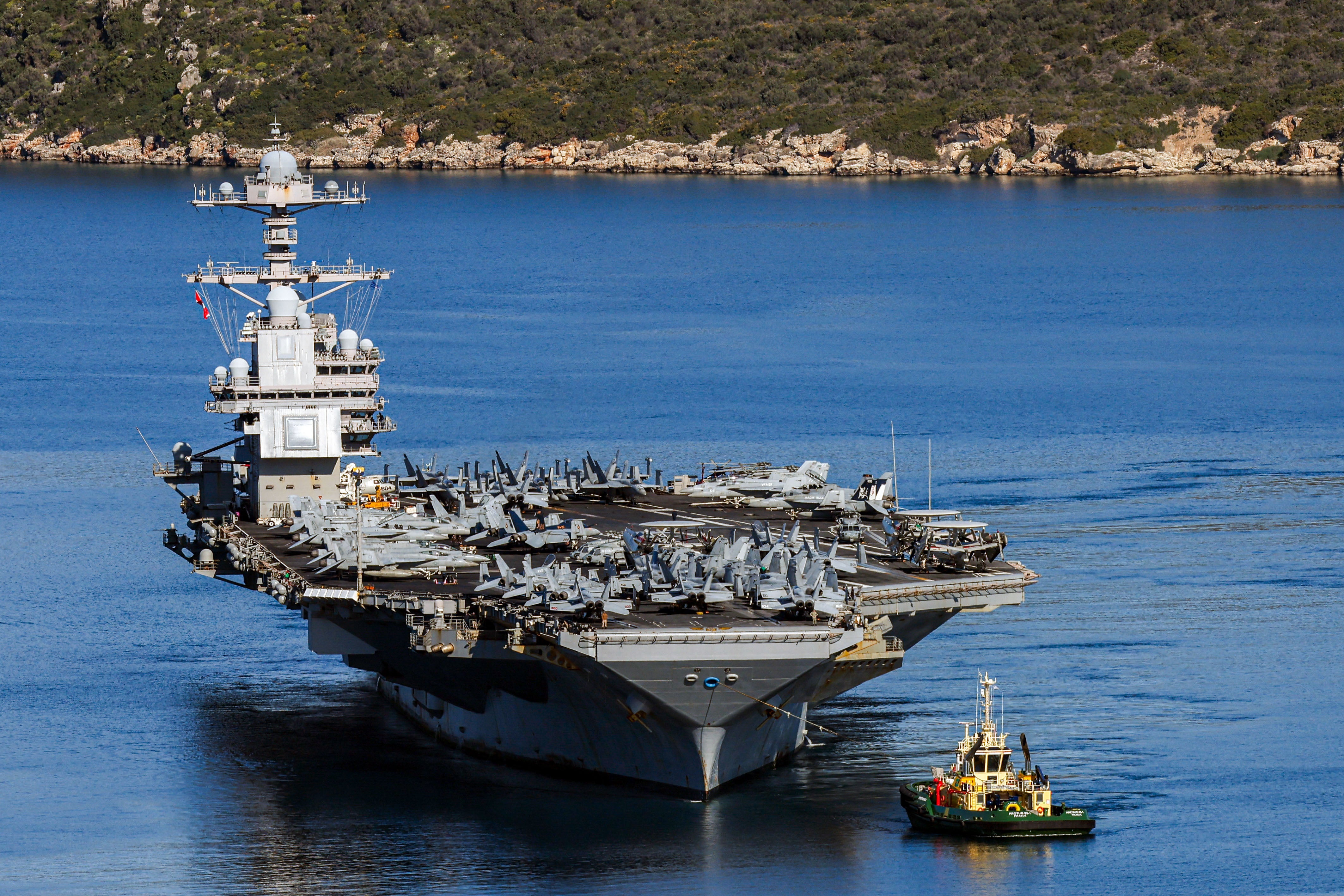 The Navy is conducting an internal assessment of whether to relocate the ship’s command-center tower, known as the island, closer to the center of the vessel (AFP via Getty Images)