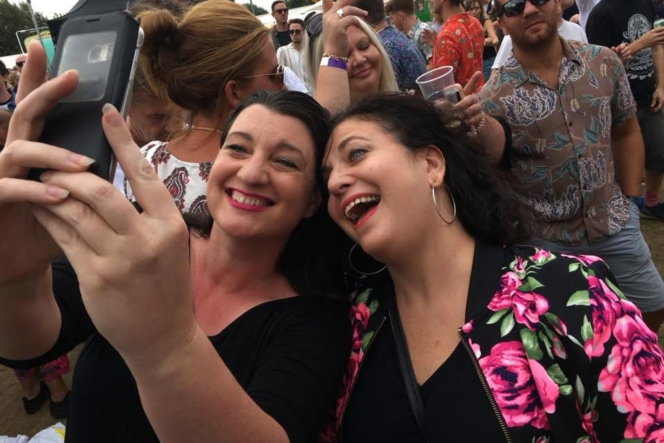 Lucy Rhoades (left) recognised something was wrong with her friend Leslie Sinoway (right) and delivered back blows, dislodging the bone (PA)
