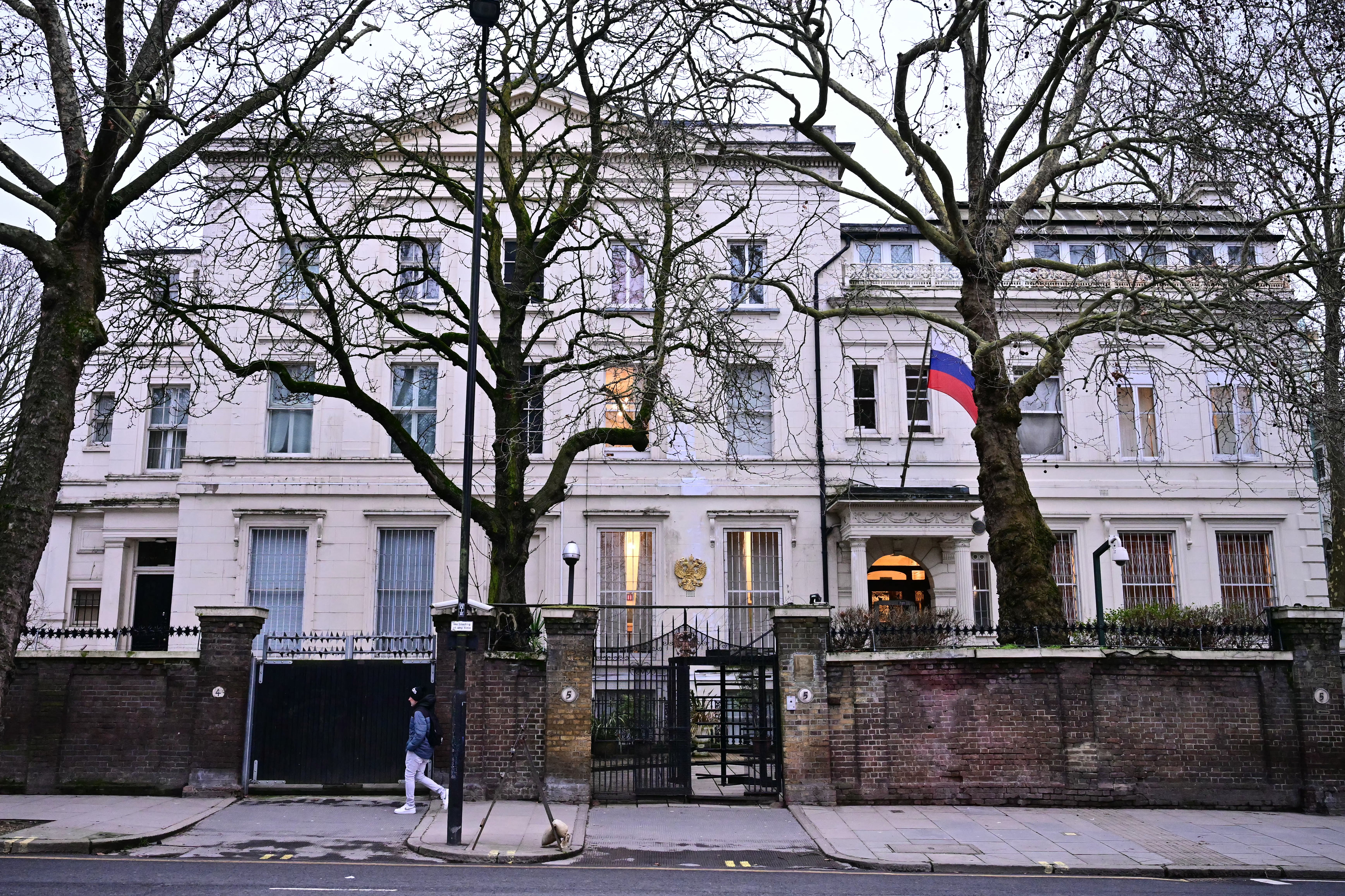 The Russian flag hangs outside the Russian Embassy in London