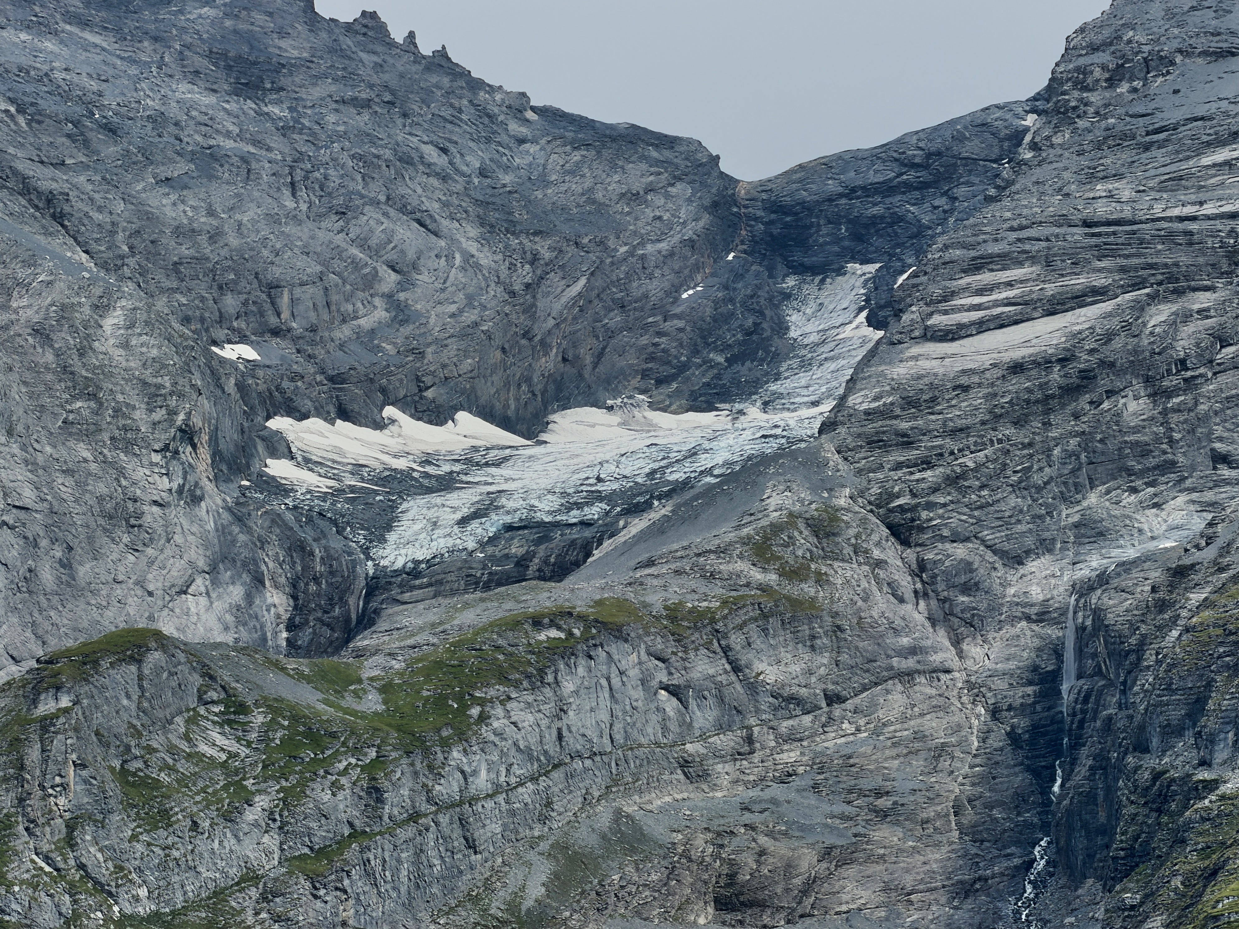 Glacier on top of Blueemlisalphorn peak seen near Kandersteg, Switzerland, Tuesday, Aug. 4, 2026. (AP Photo/Hernan Munoz)