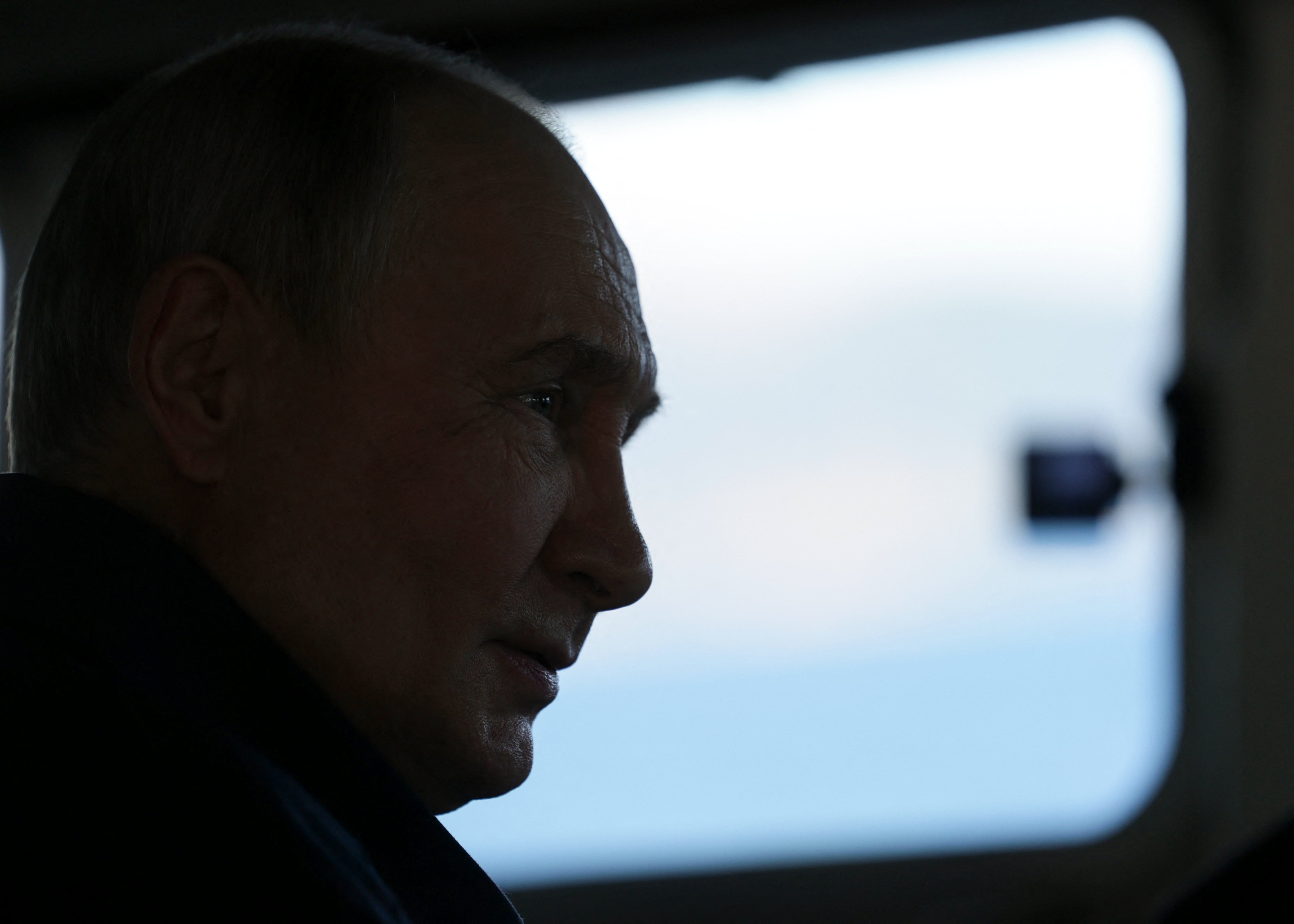 Russia's President Vladimir Putin oversees the final stage of a Pacific Fleet's naval drills from onboard the Russian Navy's guided missile cruiser Varyag off far eastern Sakhalin Island on August 12, 2026