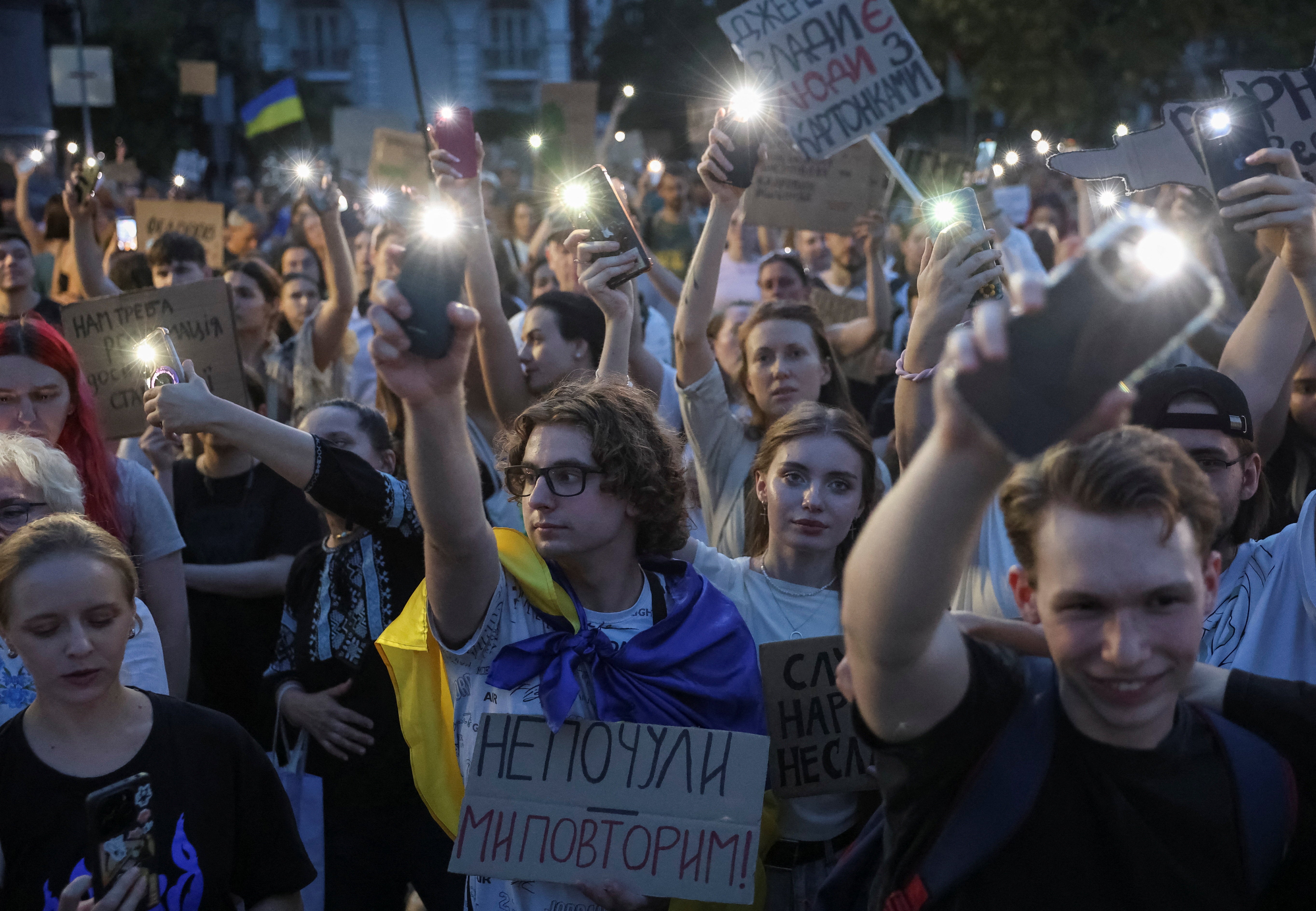 Ukrainians protests against president Volodymyr Zelenskiy's decision to remove Mykhailo Fedorov (Reuters)