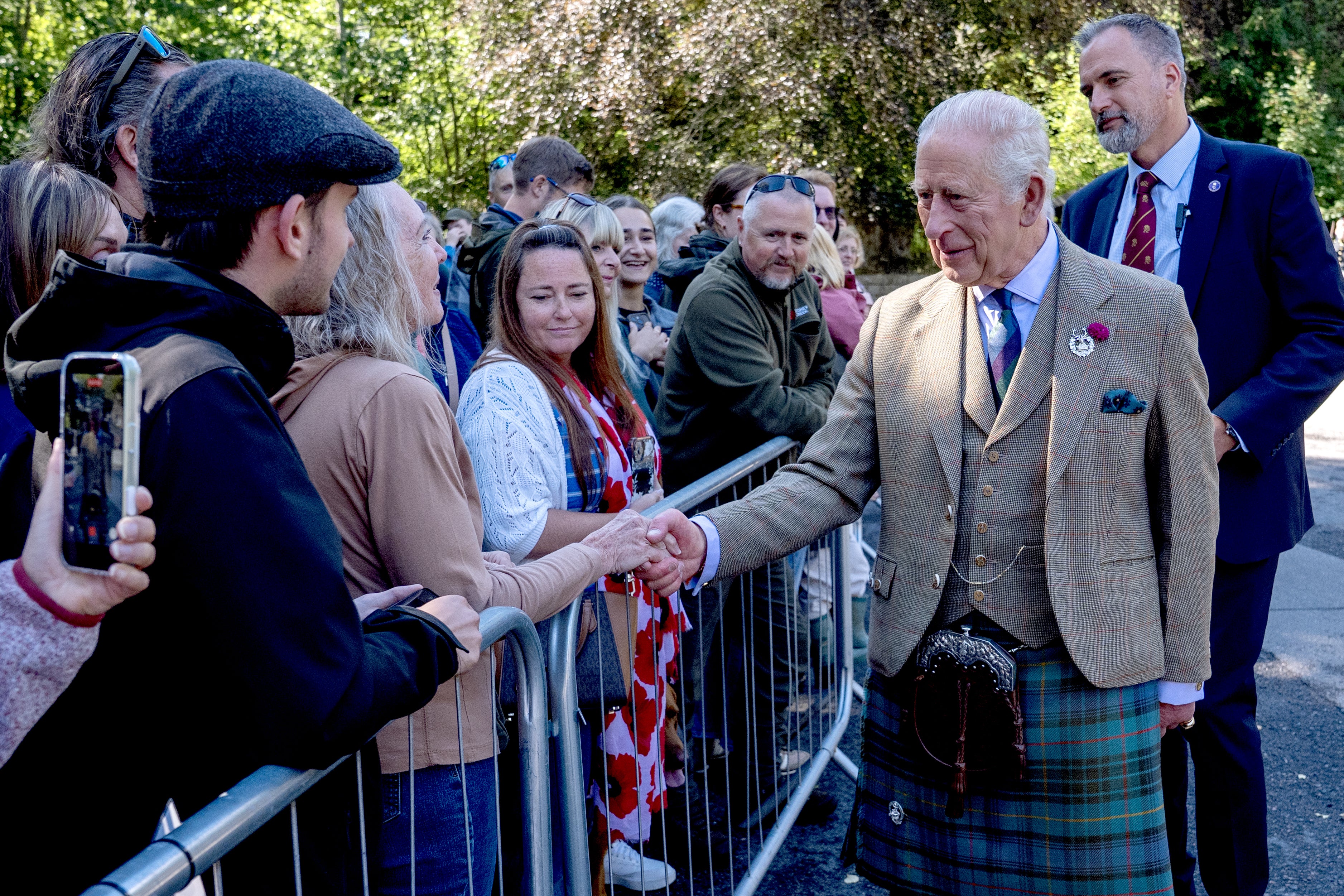 Well-wishers had gathered outside Balmoral during the ceremony and the King took time to speak to them (Jane Barlow/PA) (PA Wire)
