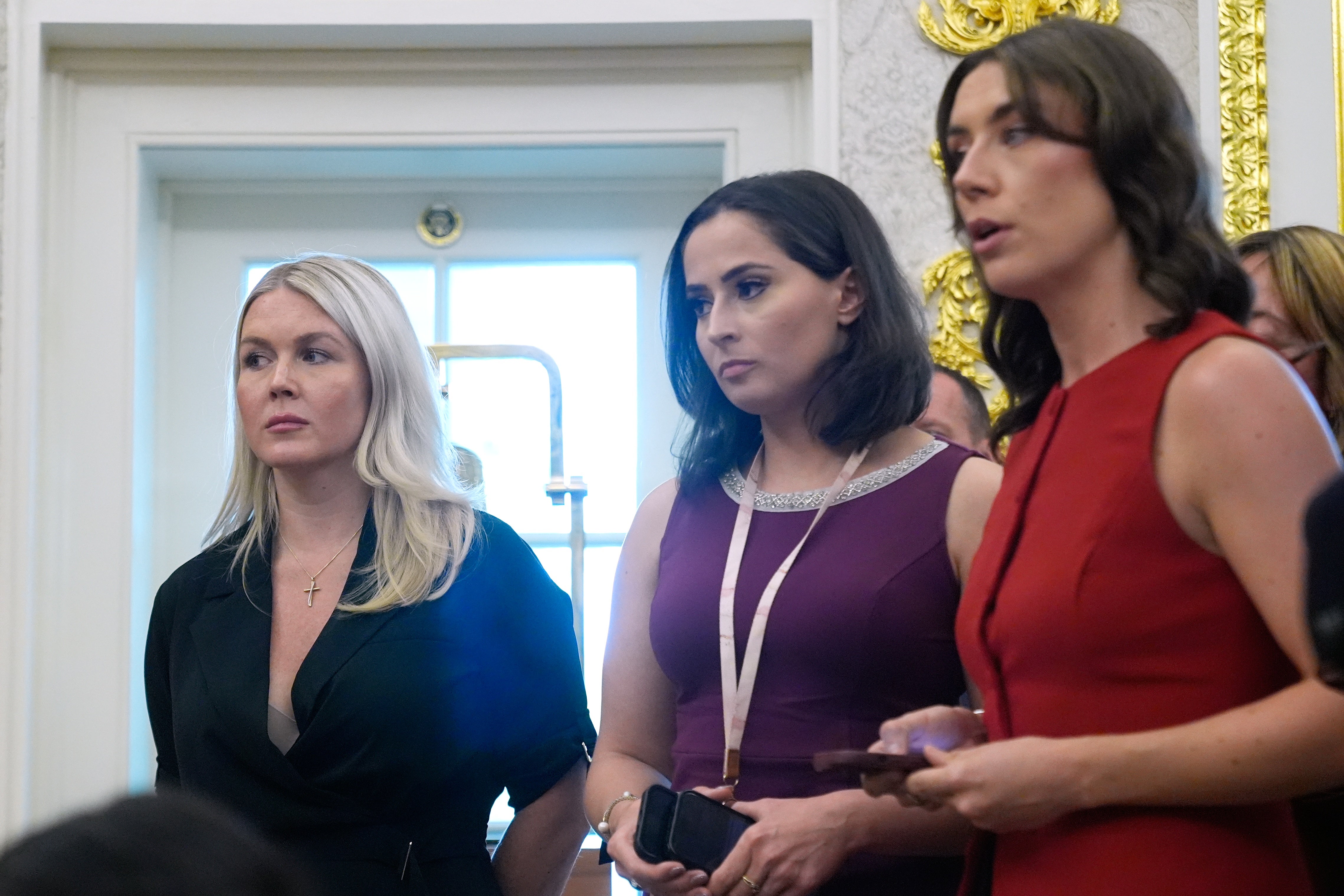 CNN and colleagues at the network have defended White House reporter Kirsten Holmes, center, after she became the latest target of the Trump administration’s war on the press and female reporters