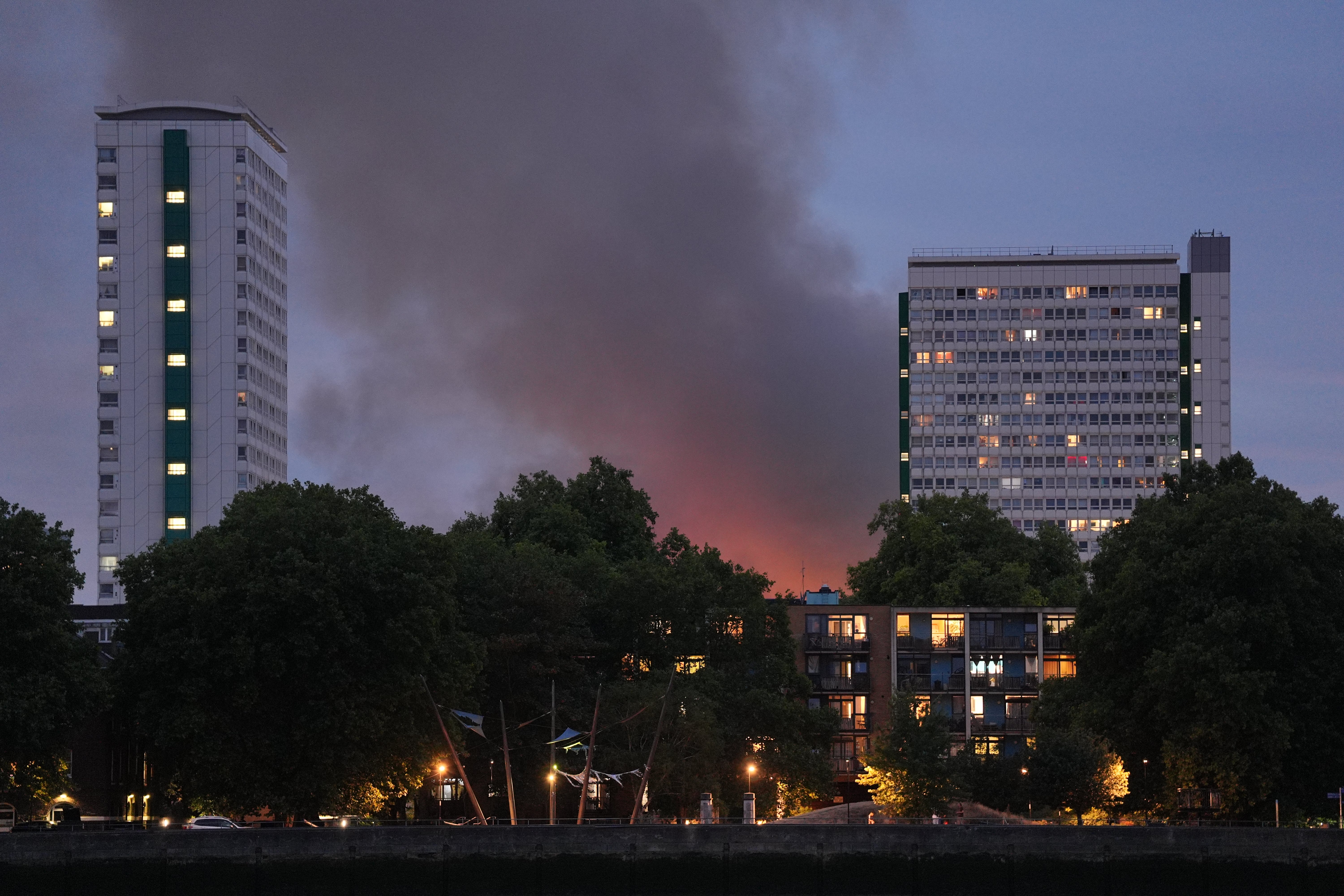 Smoke and flames from the blaze in Deptford, as seen from Millwall