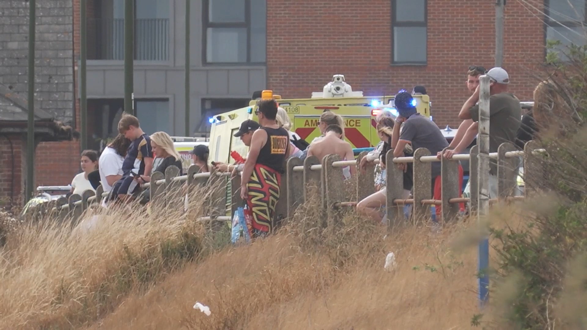 People watch after three people got into difficulty at Shoreham-by-Sea (Jamie Lashmar/PA)