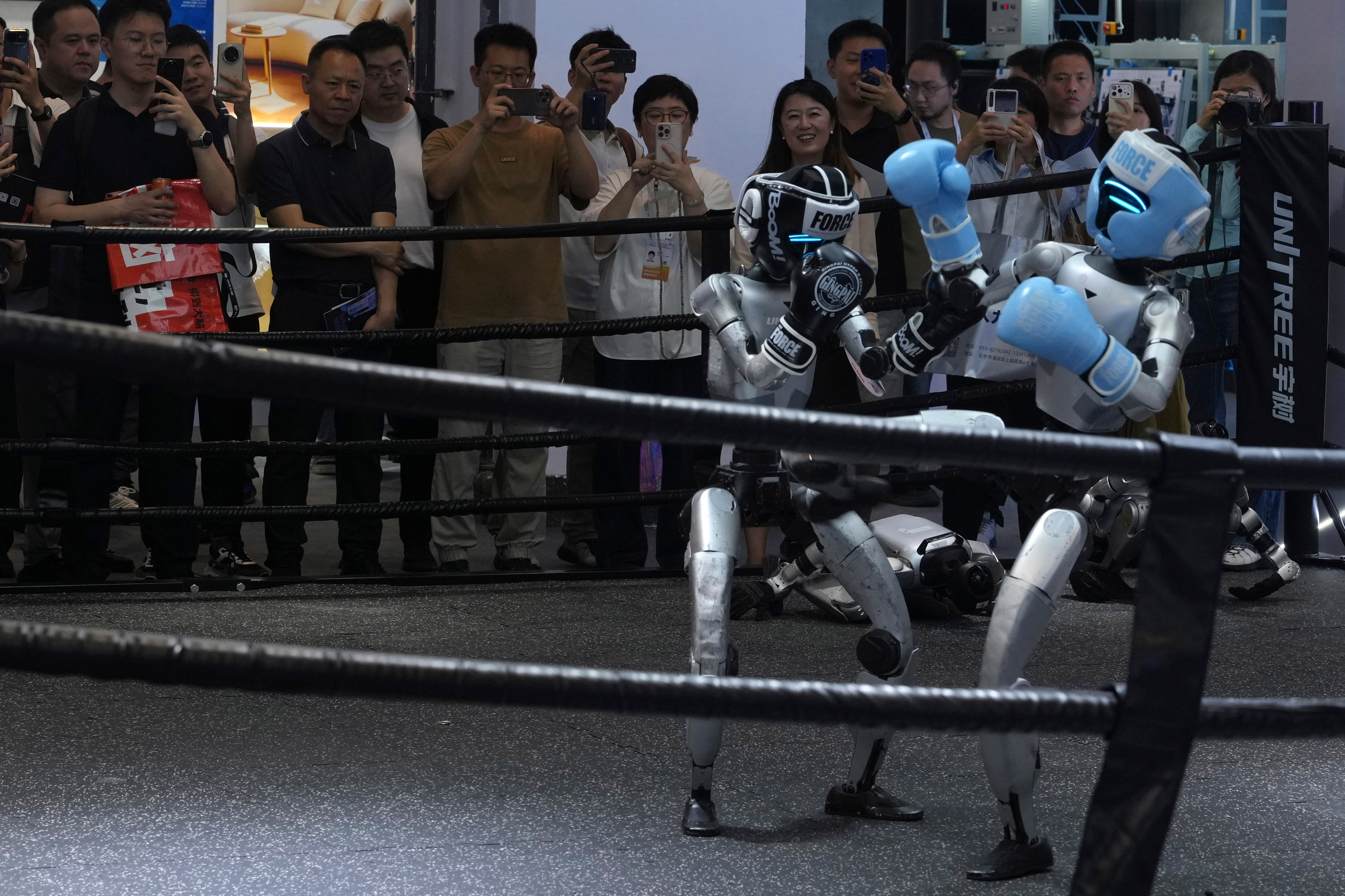Unitree Robotics machines box during the World AI Conference in Shanghai (AP)