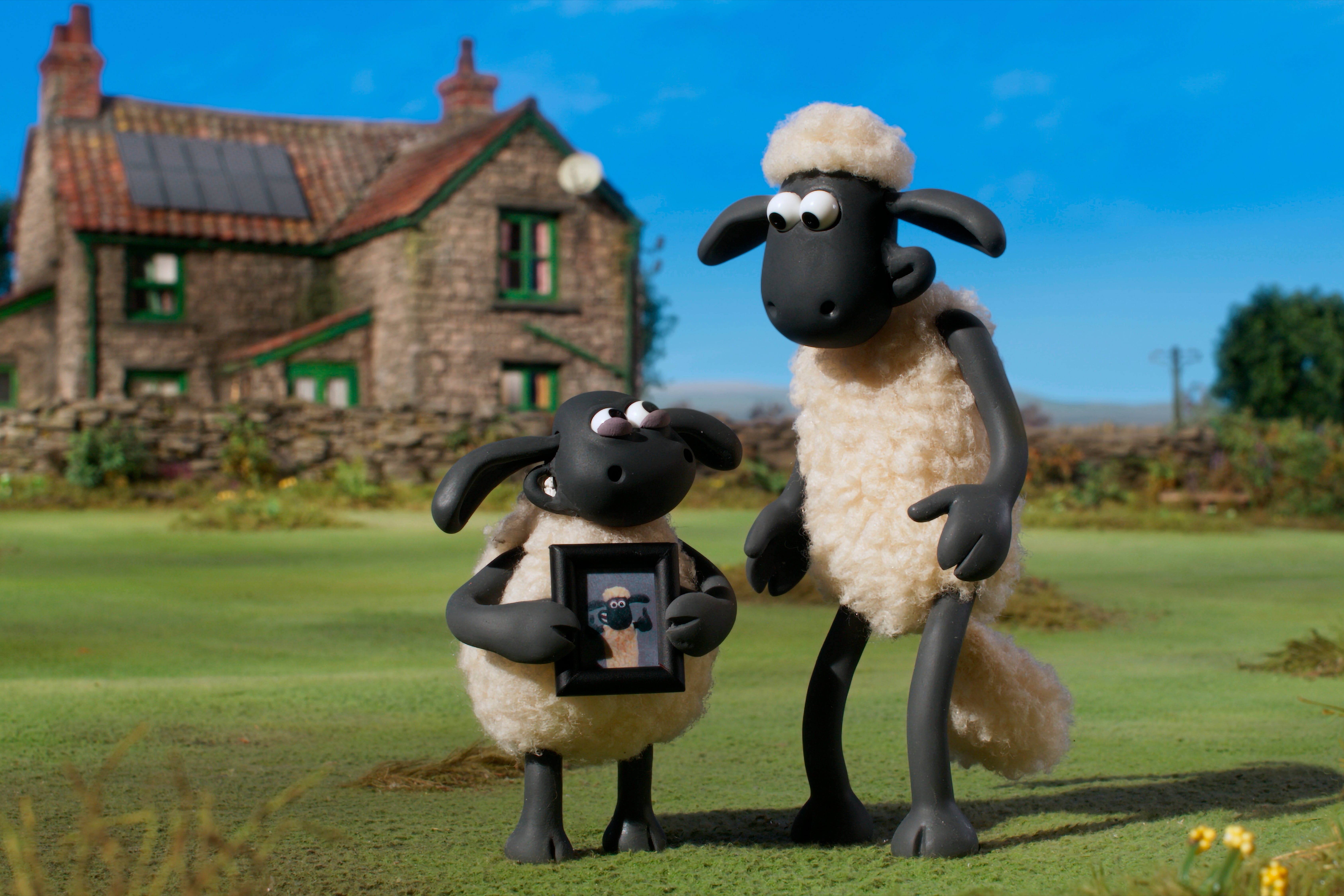 Shaun the sheep, right, with his cousin Timmy the lamb (PA)