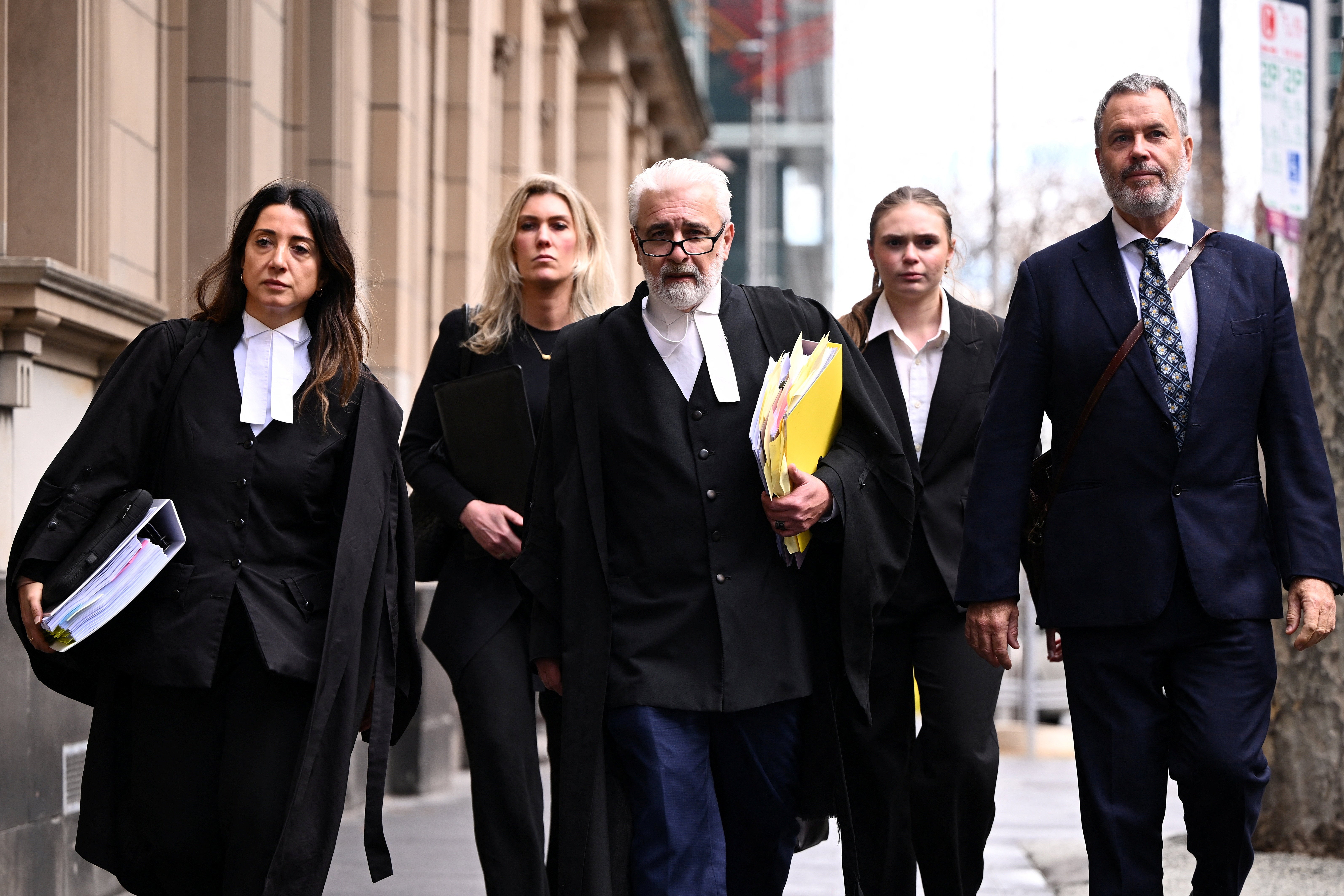 Erin Patterson’s barristers Veronika Drago and Richard Edney, and solicitor Bill Doogue, return to court during a break at the Supreme Court in Melbourne, Australia, on 19 August 2026