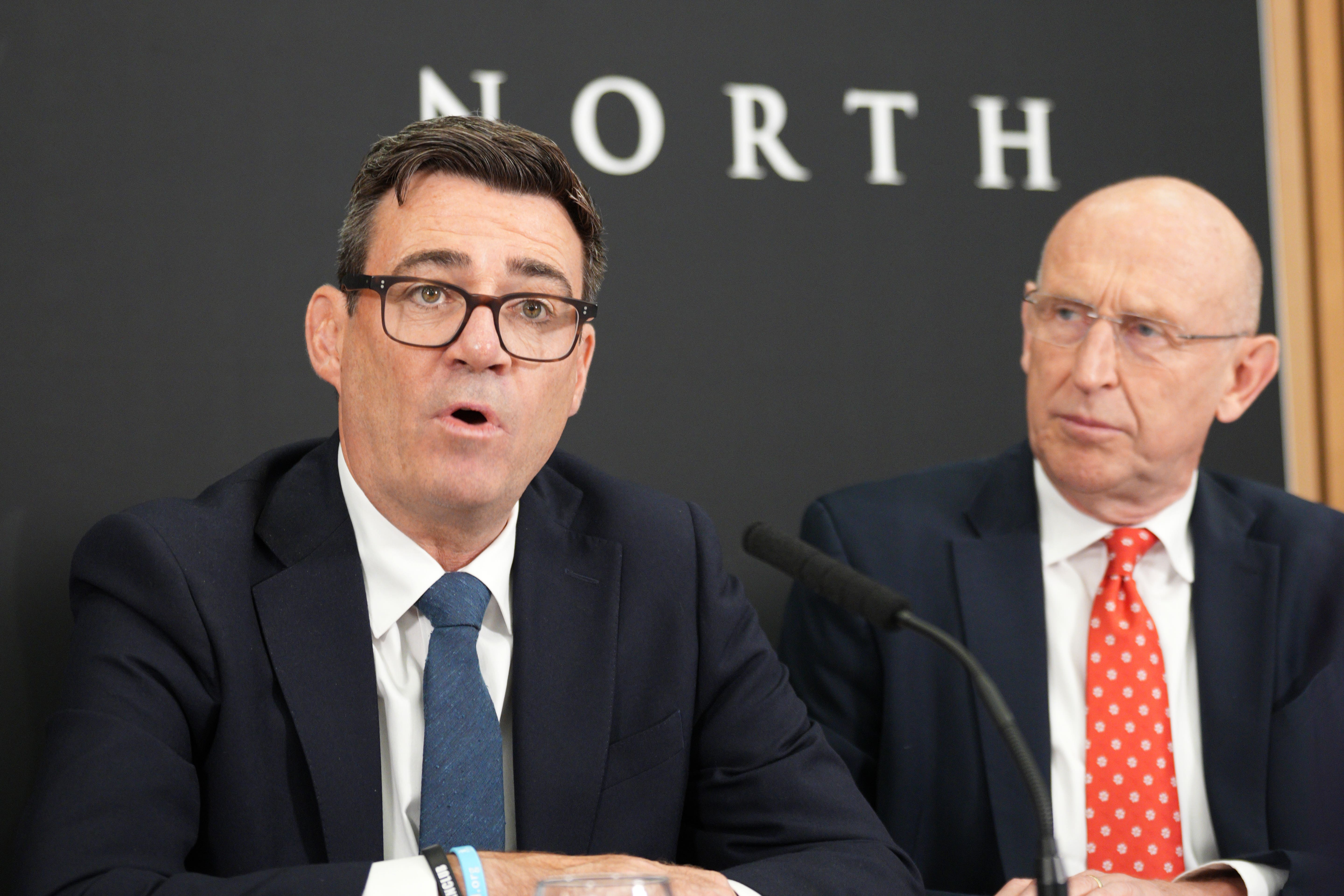Andy Burnham and John Healey, the new chancellor (Christopher Furlong/PA)