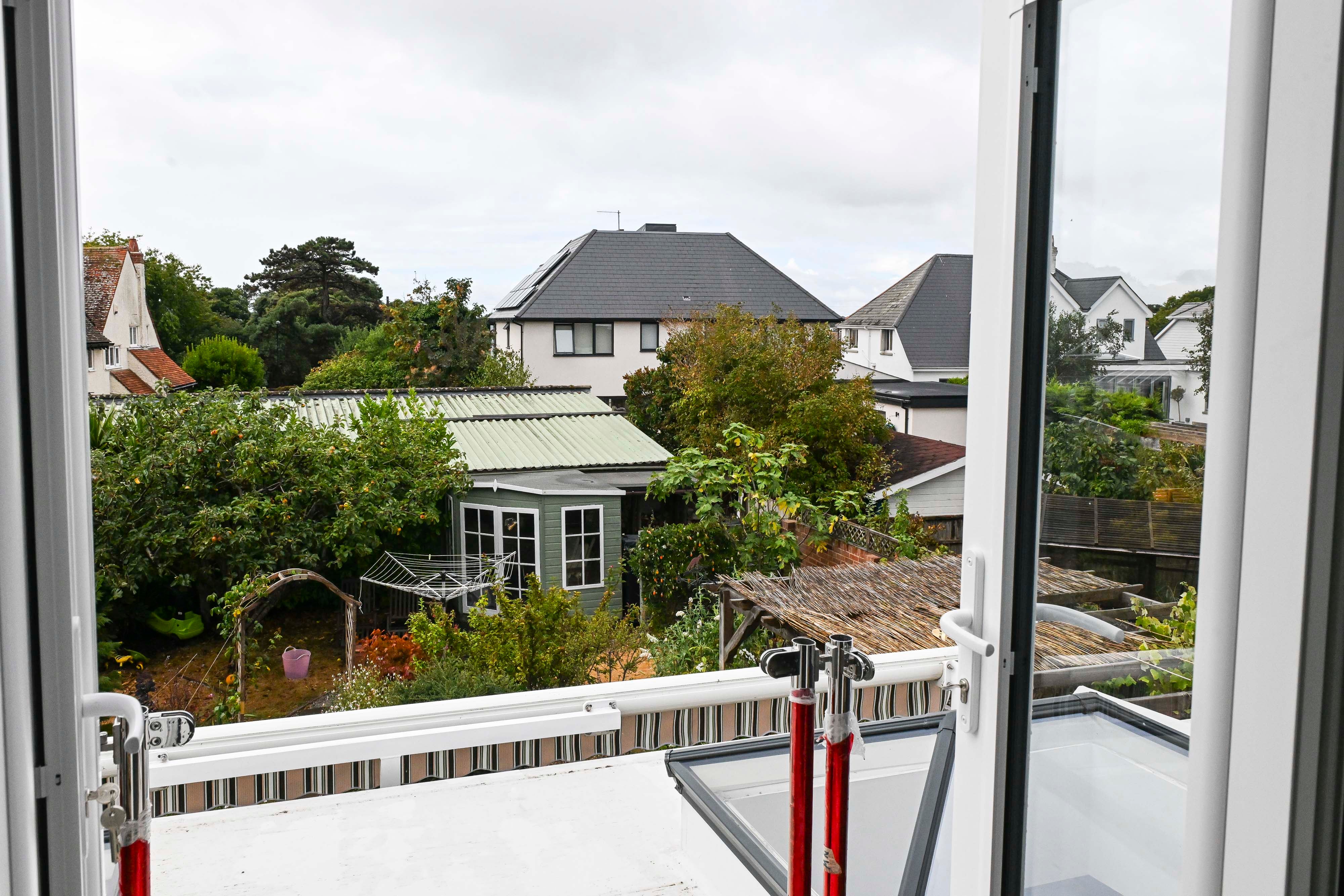 The view of Michele Venton's house (centre) from Ian Bray's French doors