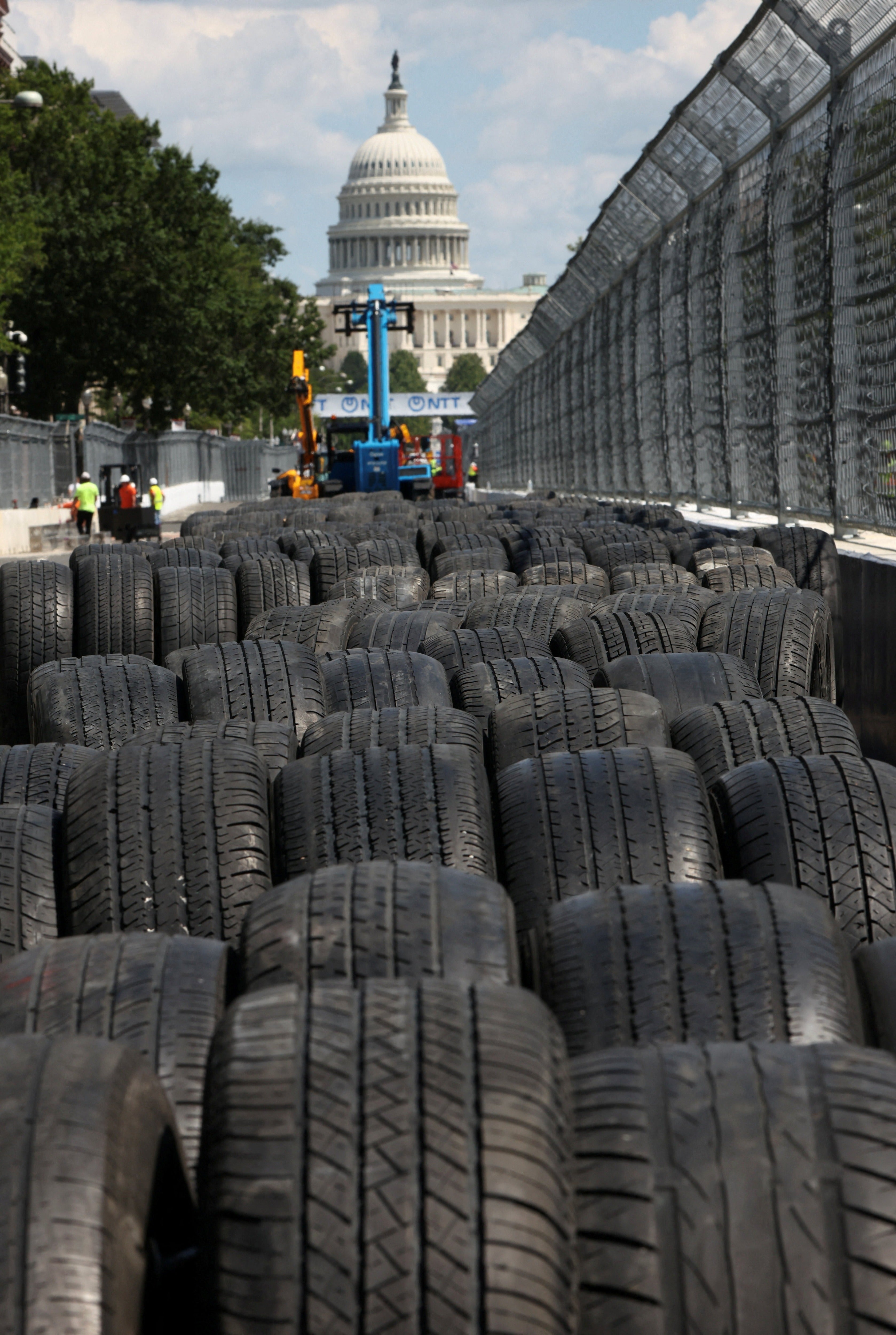 Tires line a section of the race track as preparations continue