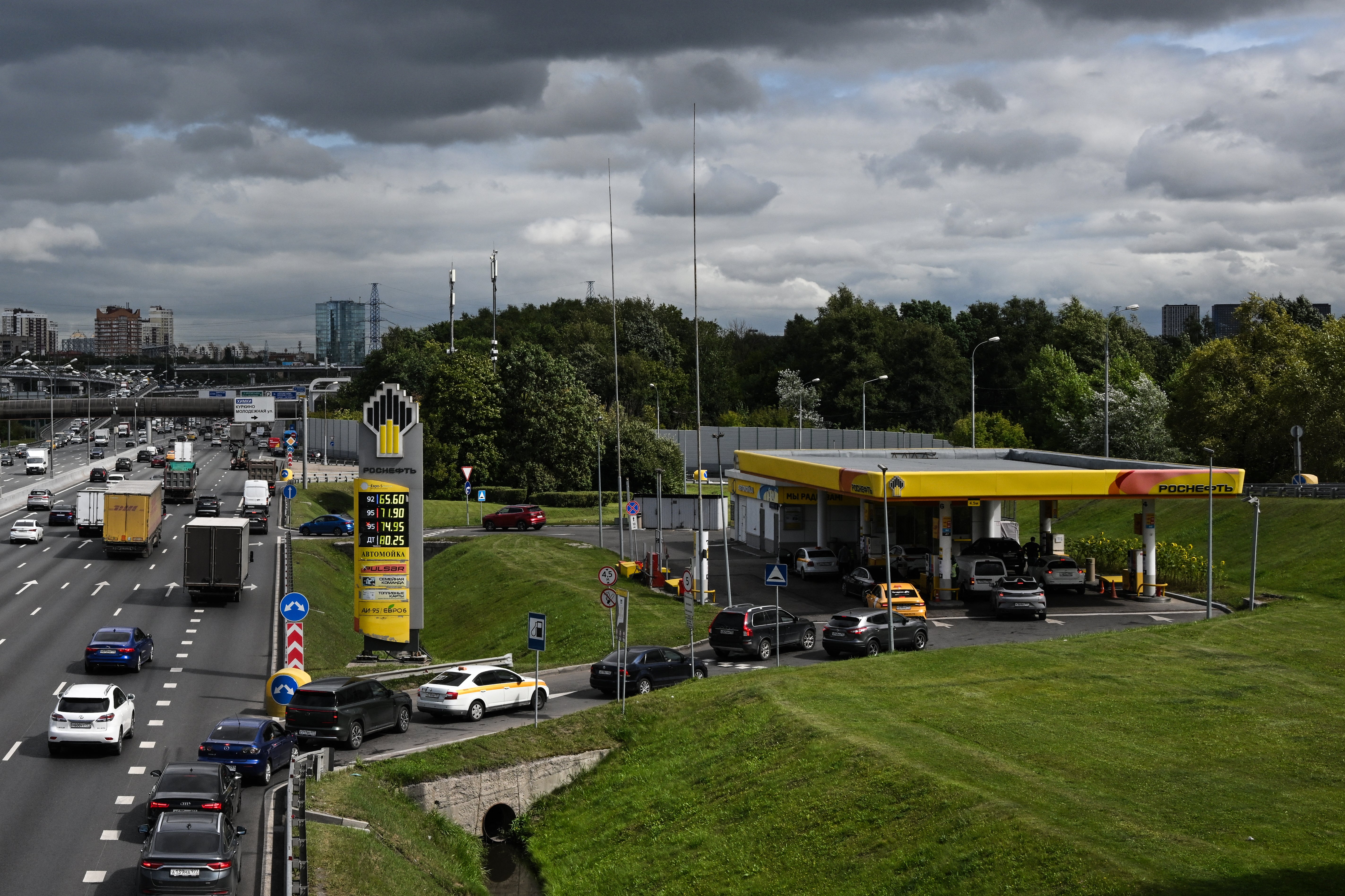 Drivers stuck in a long queue at a Rosneft petrol station in Moscow
