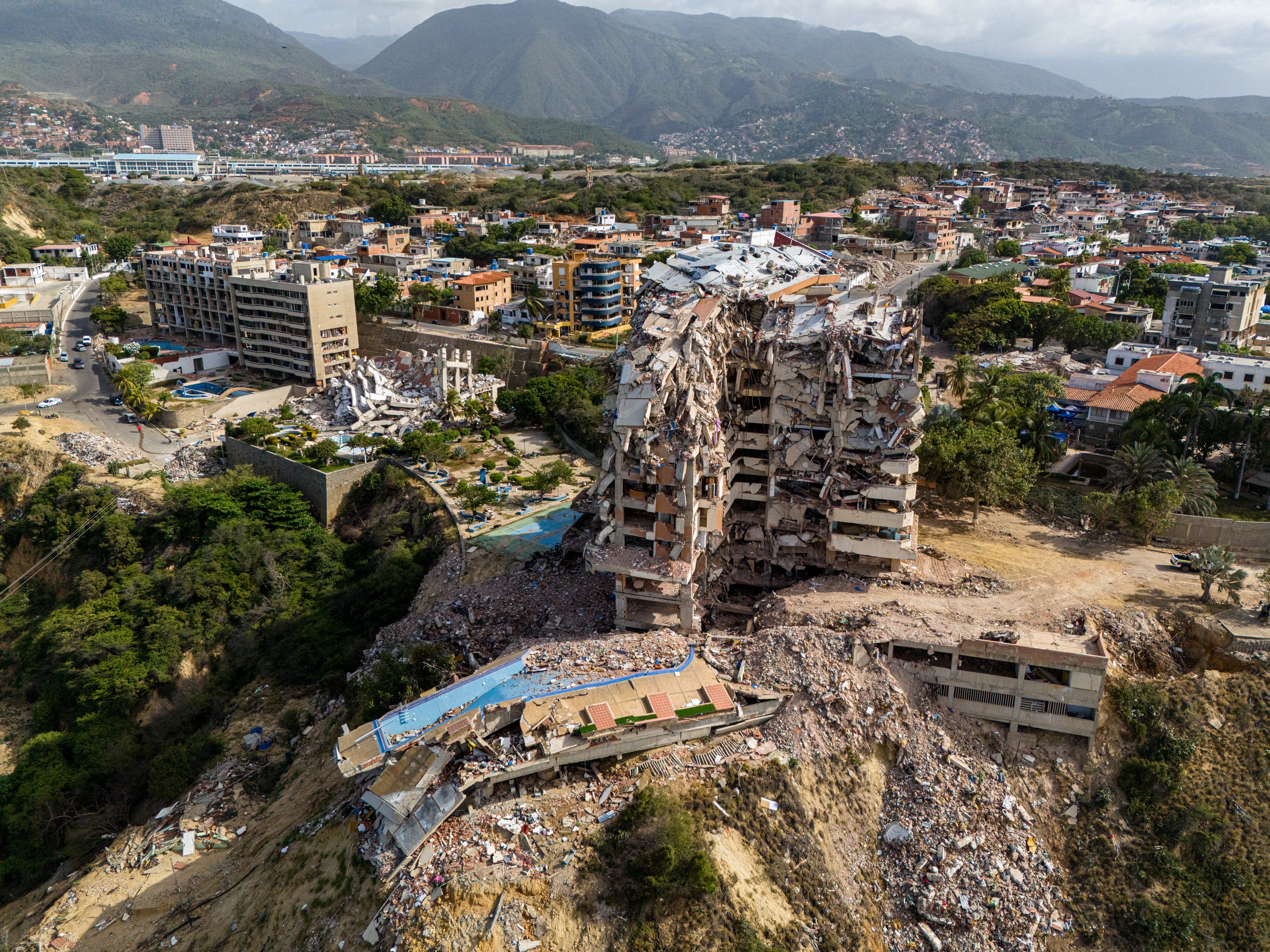 An aerial view shows an area affected by the collapse of structures after an earthquake in Catia La Mar, Venezuela, earlier this summer. Venezuela saw two back-to-back earthquakes in June