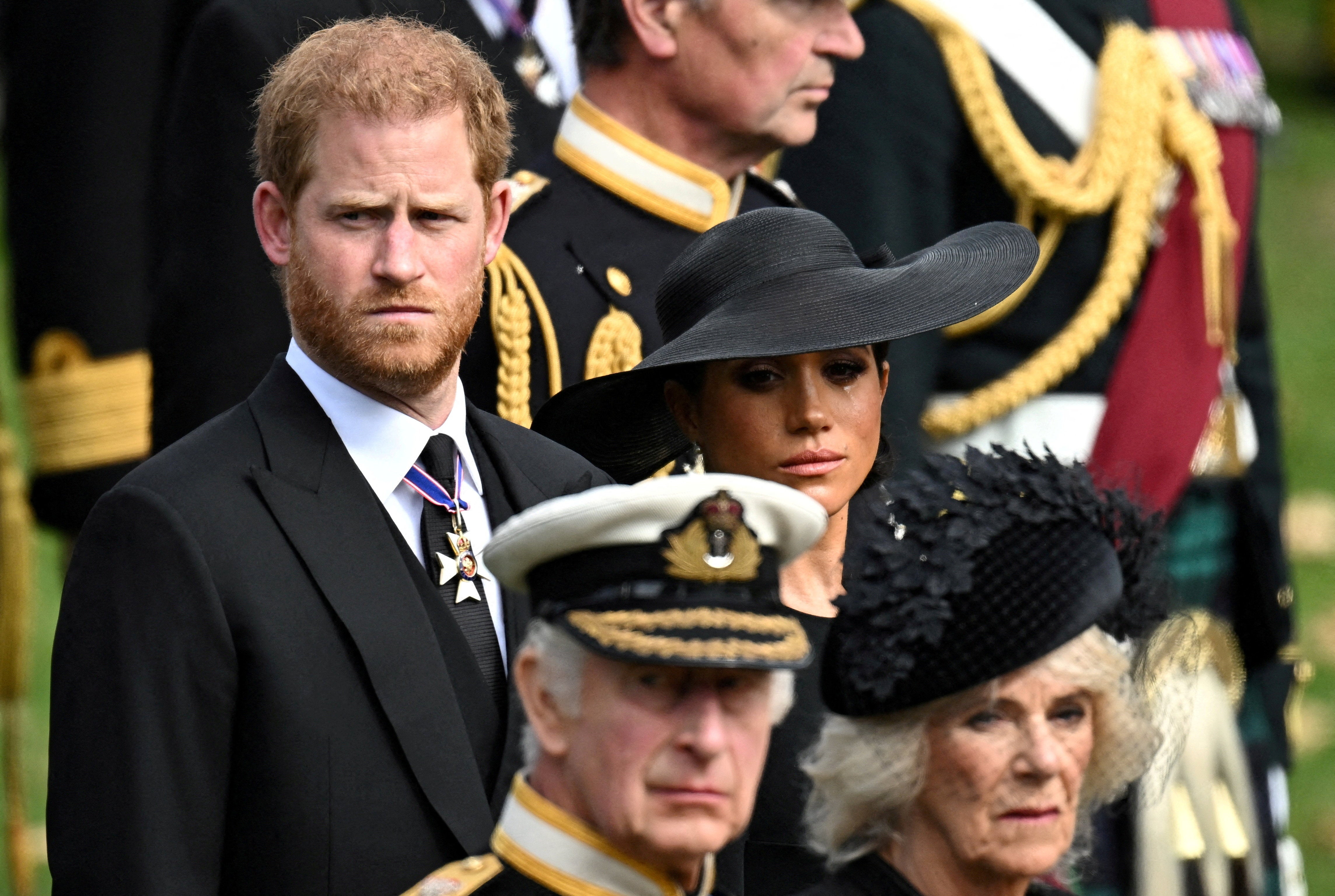 FILE PHOTO: Britain's Meghan, Duchess of Sussex, reacts as she, Prince Harry, Duke of Sussex, Queen Camilla and King Charles attend the state funeral and burial of Britain's Queen Elizabeth, in London