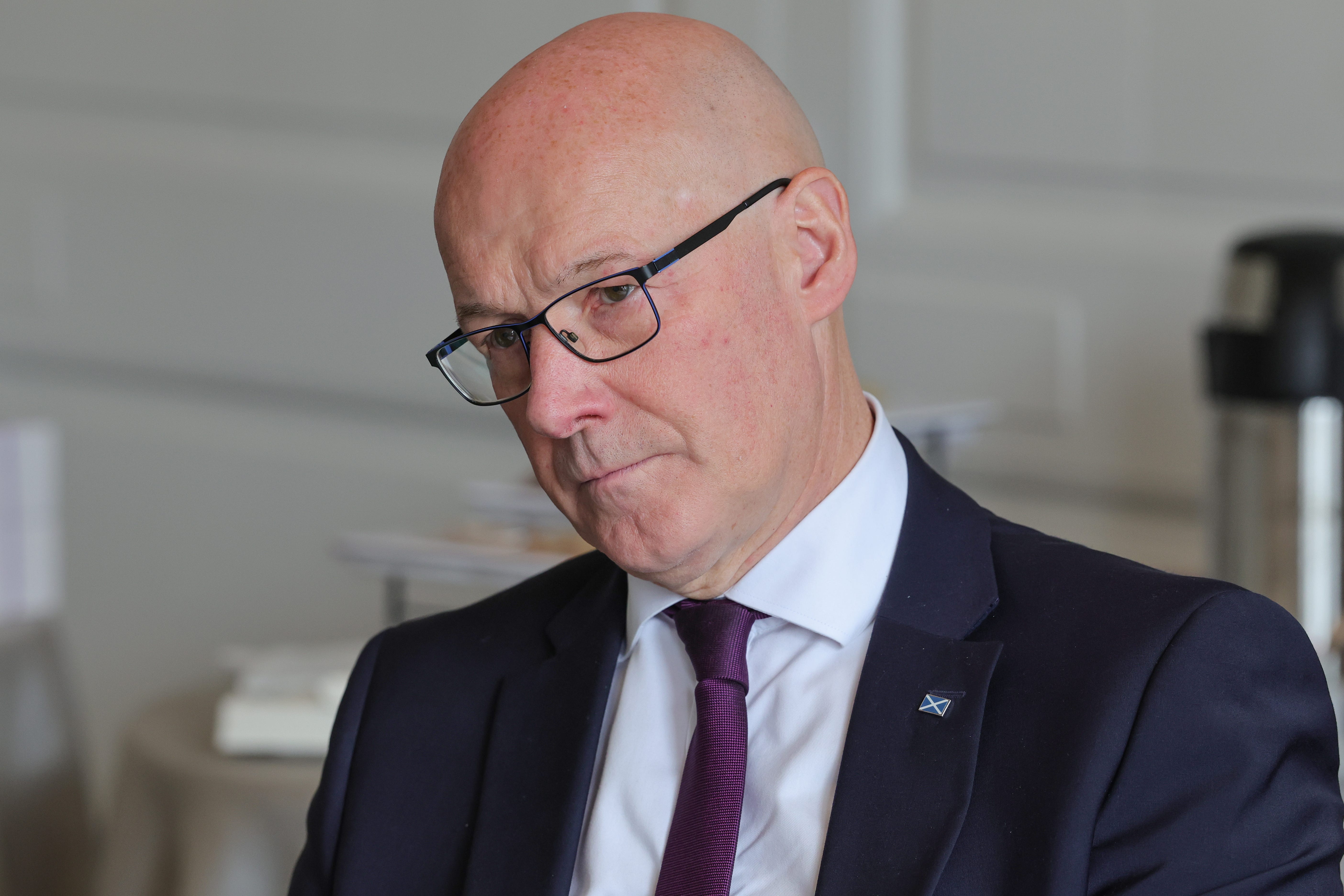 First Minister John Swinney paid tribute to Dolly Parton