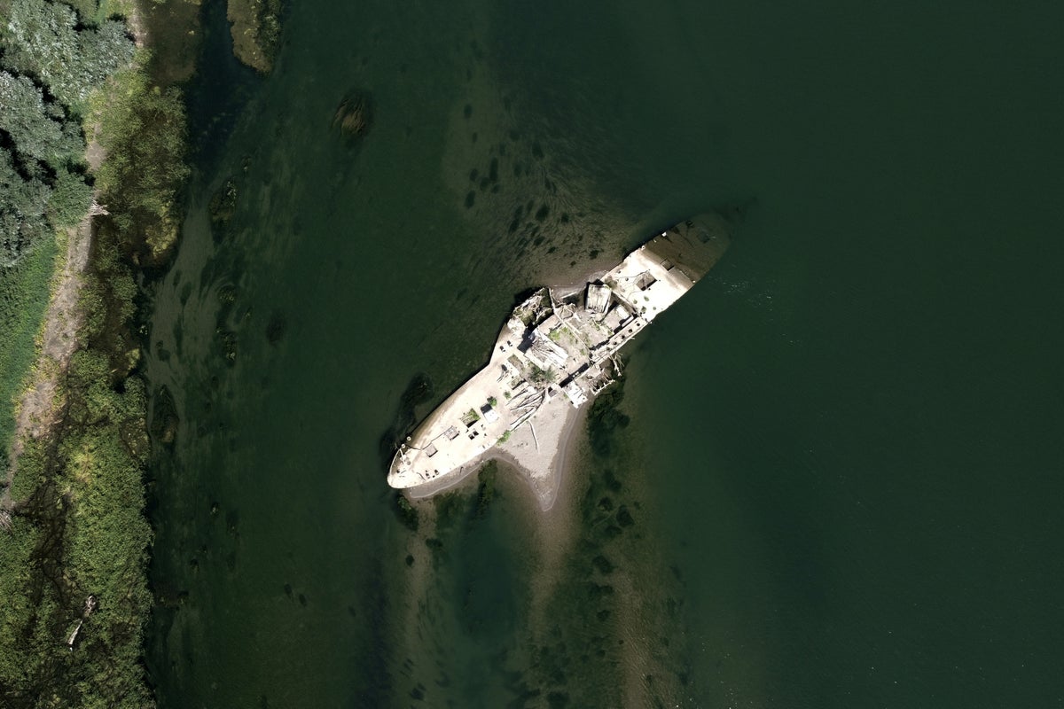 Historic steam tugboat revealed as drought lowers Serbian river levels