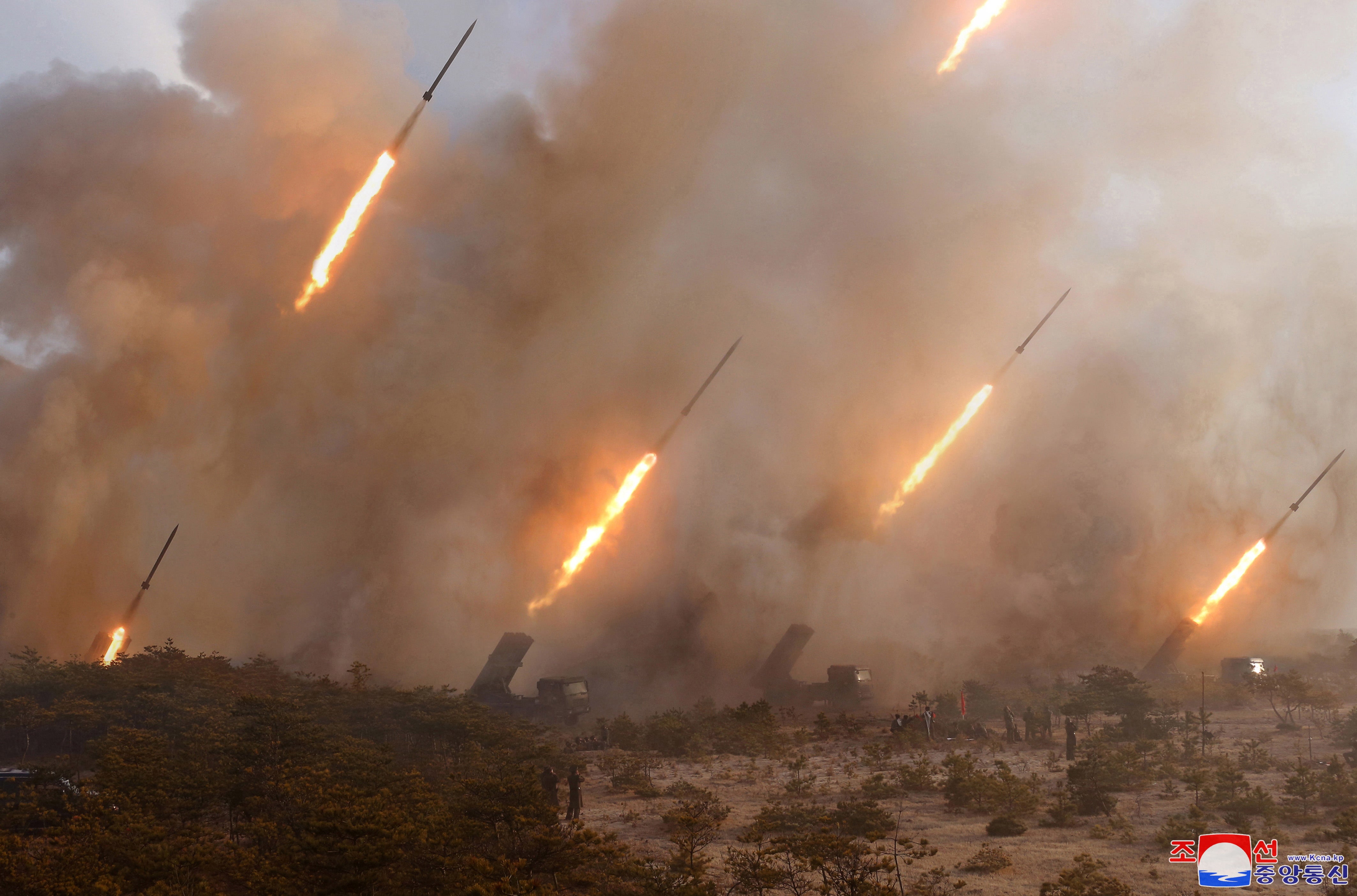 A photo released by the official North Korean Central News Agency (KCNA) shows the conducting of another firepower strike drill of long-range artillery sub-units of the Korean People's Army, guided by Kim Jong-Un (not pictured), chairman of the Workers' Party of Korea, chairman of the State Affairs Commission of the Democratic People's Republic of Korea and supreme commander of the armed forces of the DPRK, at an undiclosed location in North Korea, 09 March 2020