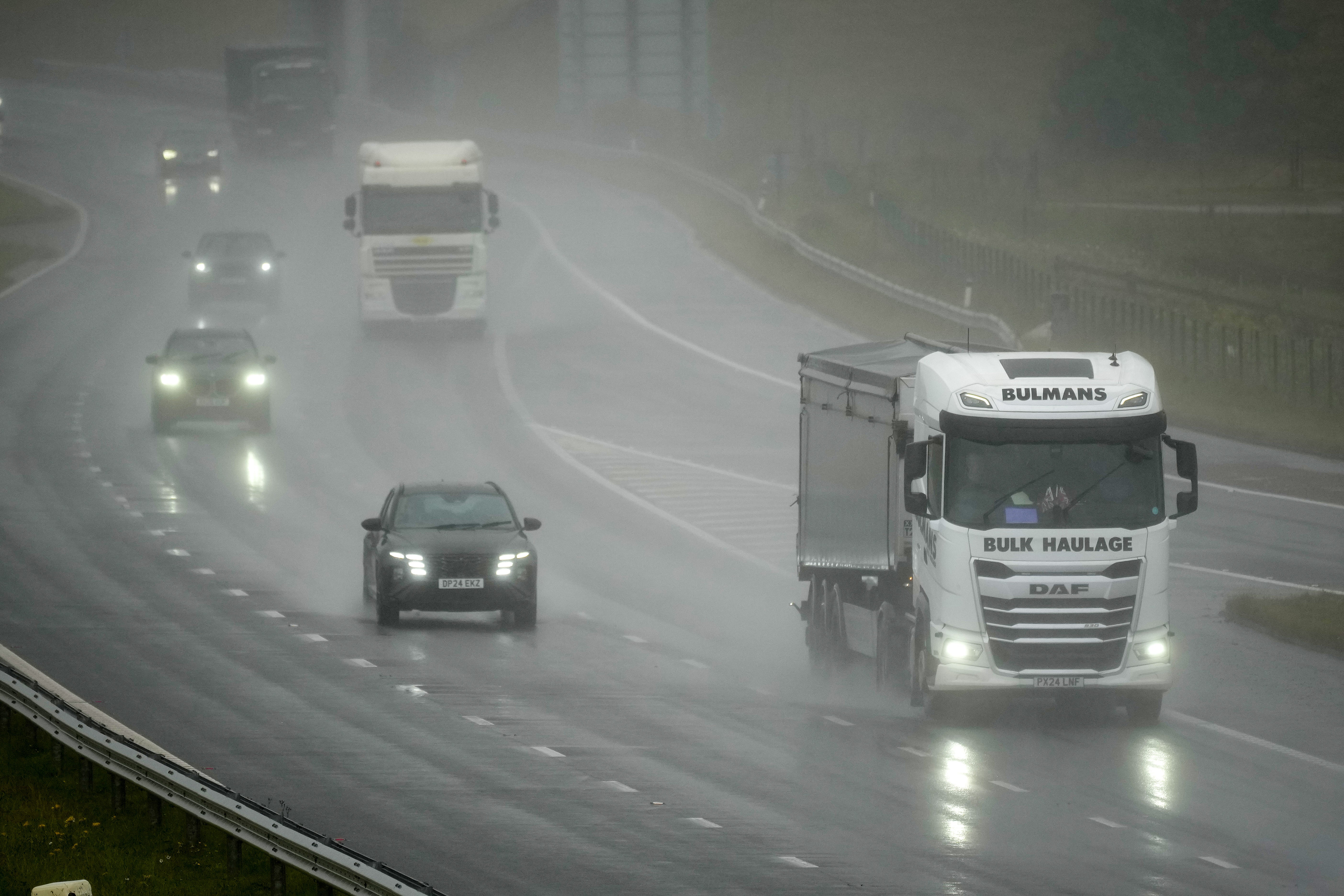 UK hit with heavy rain and thunderstorms as Met Office warns of flash flooding
