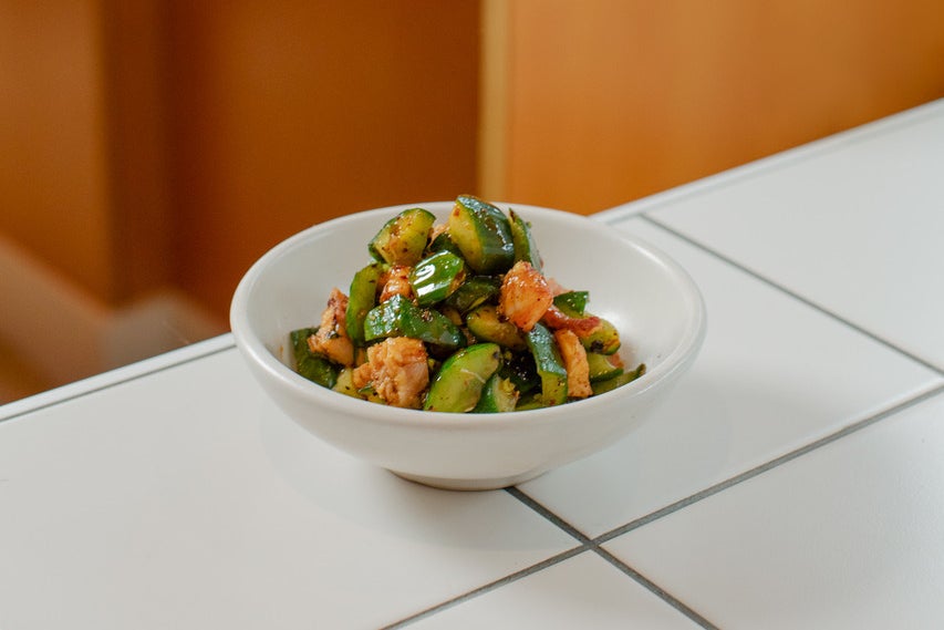 Smoked eel brings richness to crunchy cucumber dressed with black vinegar, garlic and Sichuan chilli oil (Bao)