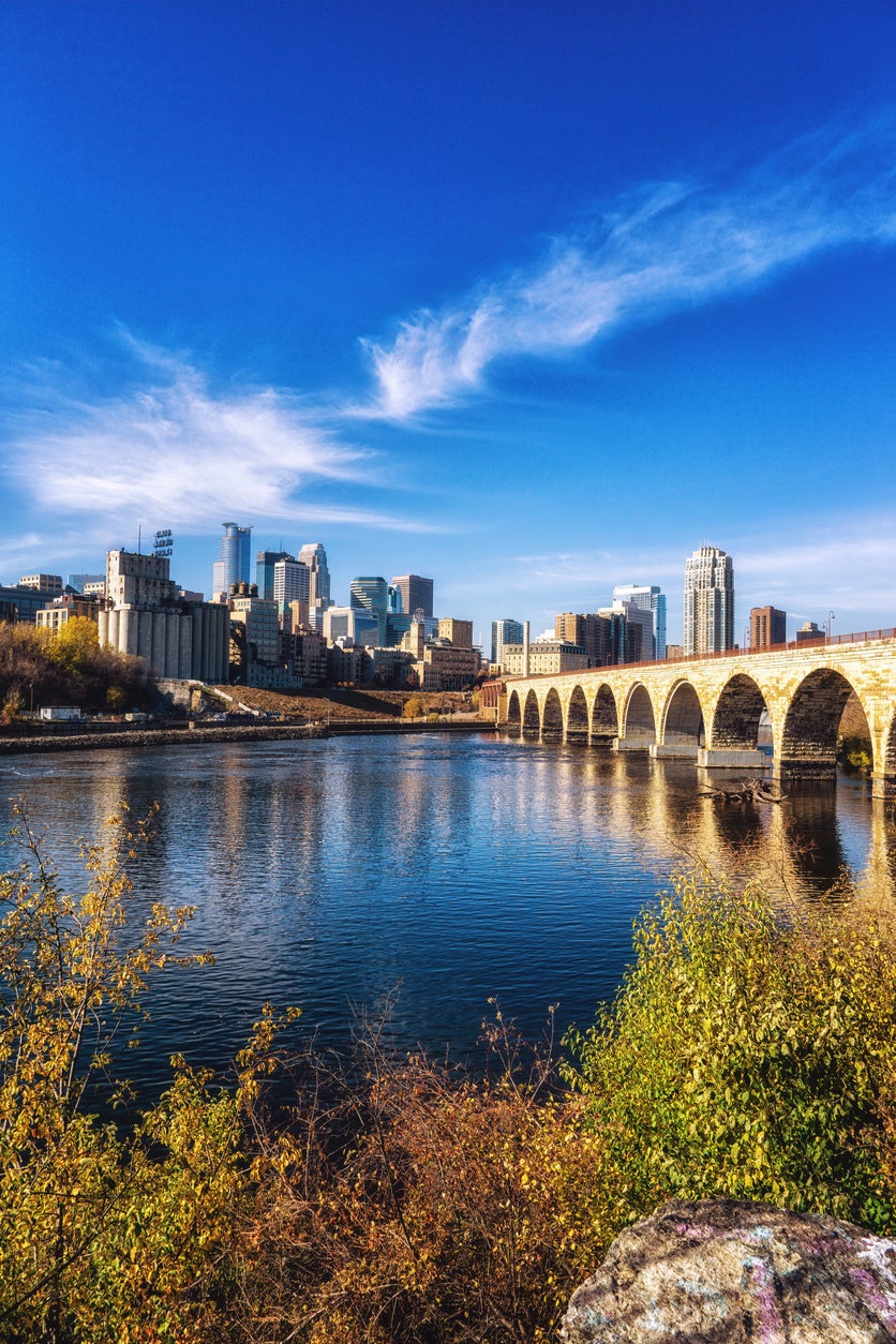 Third body found Monday afternoon near the Mississippi River and Stone Arch Bridge (pictured)