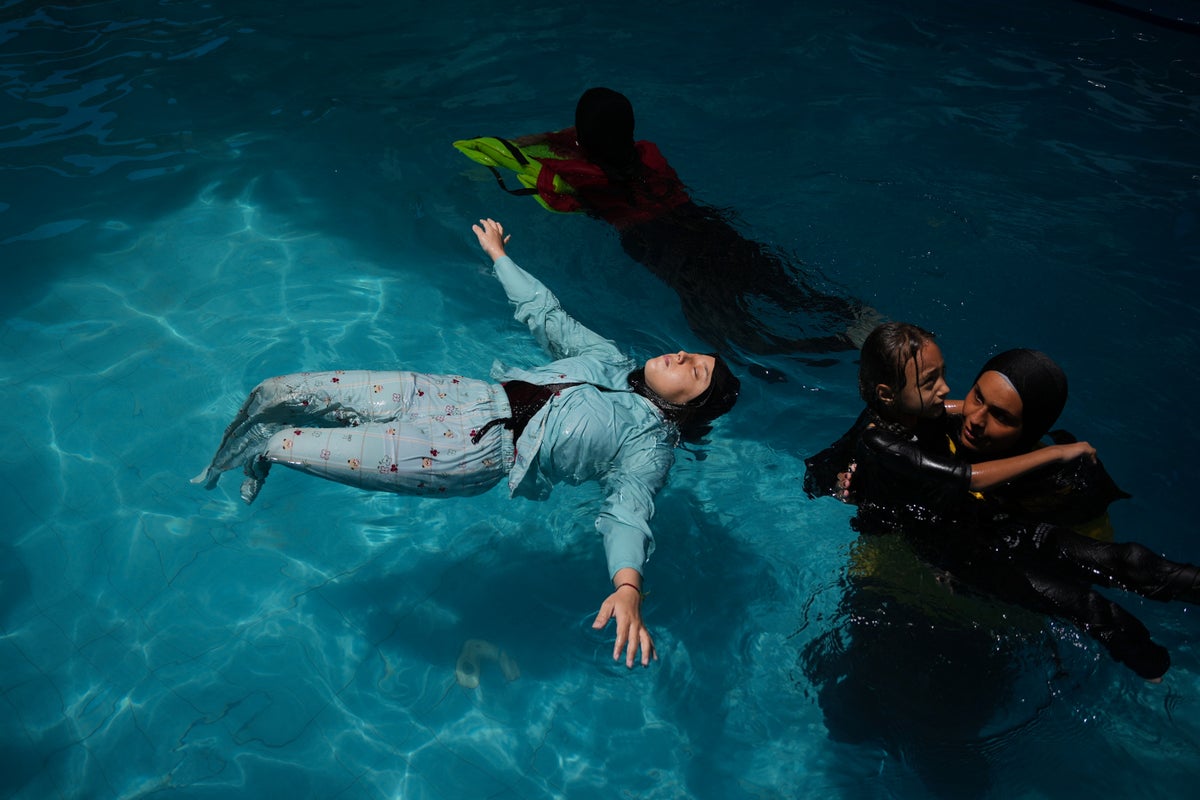 Palestinian children who lost limbs in the Israel-Hamas war learn to swim in Gaza