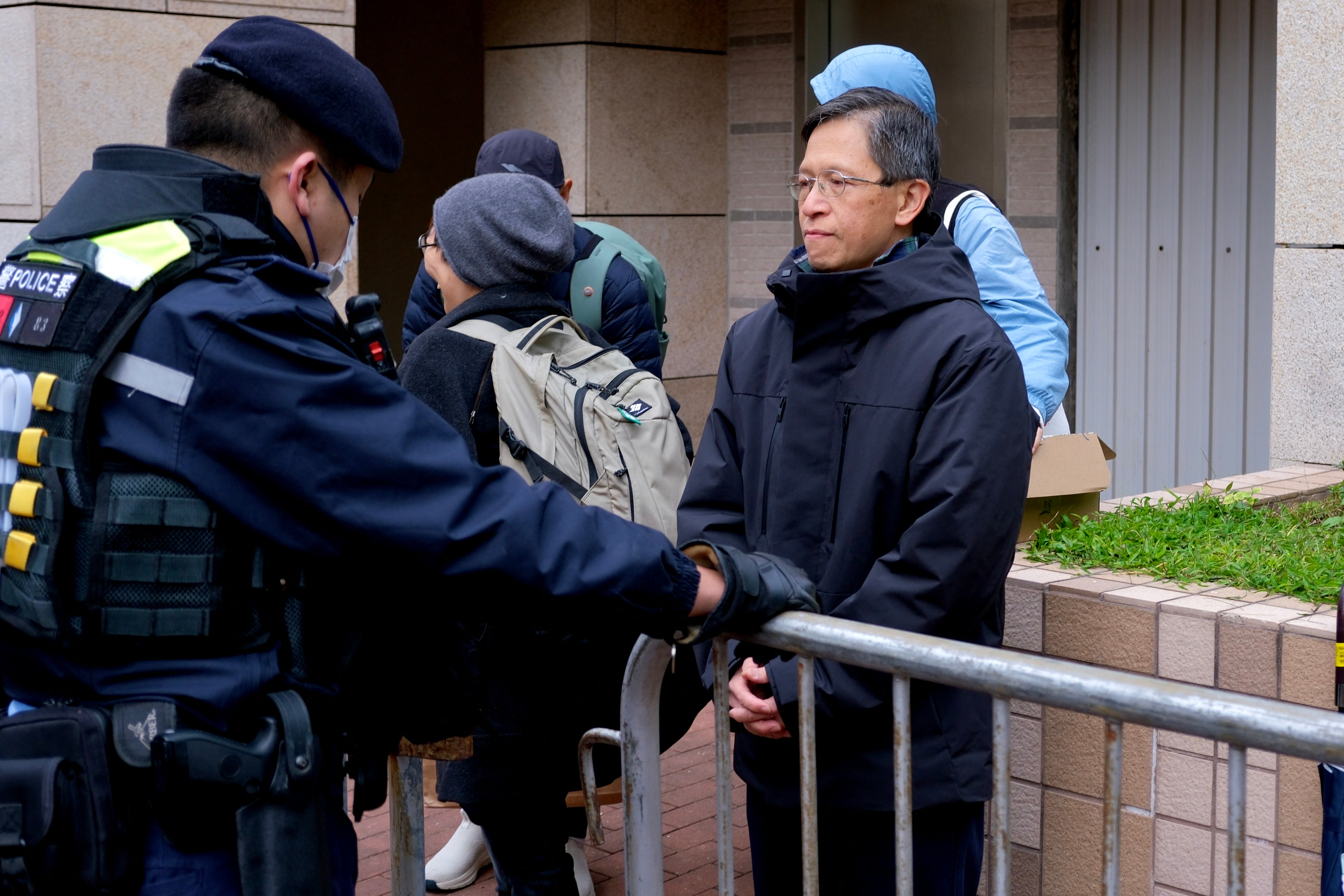Tang Ngok-kwan (R), a Tiananmen vigil activist and former committee member for Hong Kong Alliance in Support of Patriotic Democratic Movements of China (AFP/Getty)