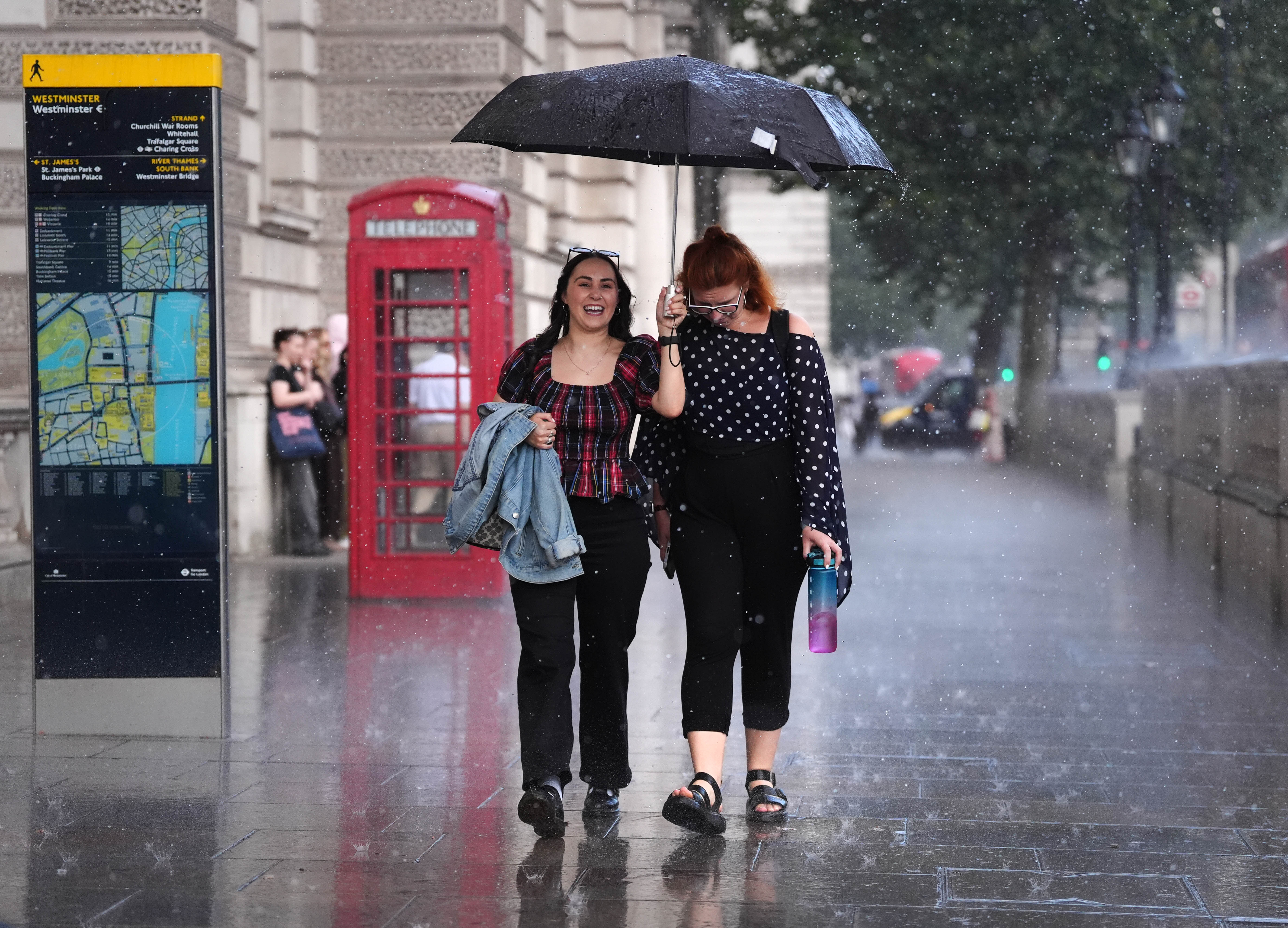 Flash flood warnings for UK as heavy rain batters drought-hit ground