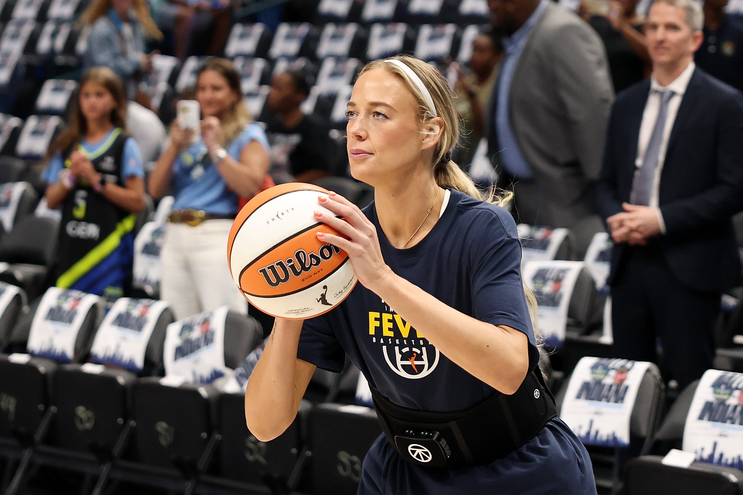Sophie Cunningham #8 of the Indiana Fever participates in warmups prior to a game against the Dallas Wings at American Airlines Center on August 20