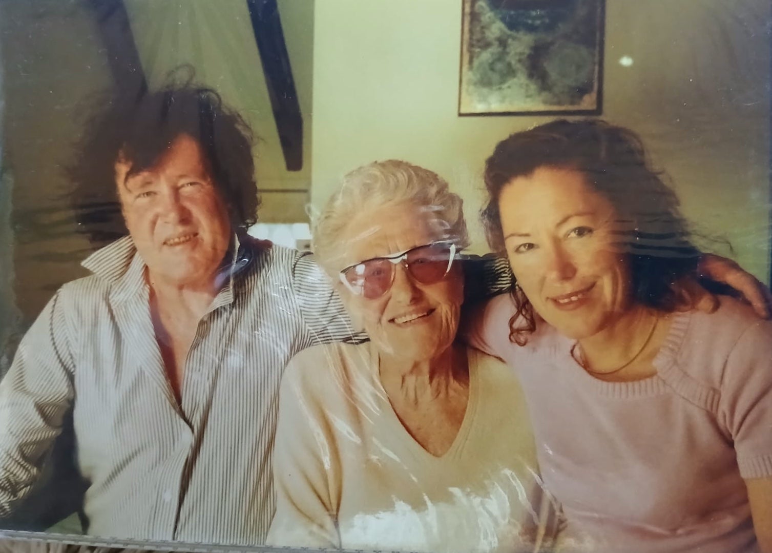 Jules (Adriana's brother), her mother, and Adriana 25 years ago