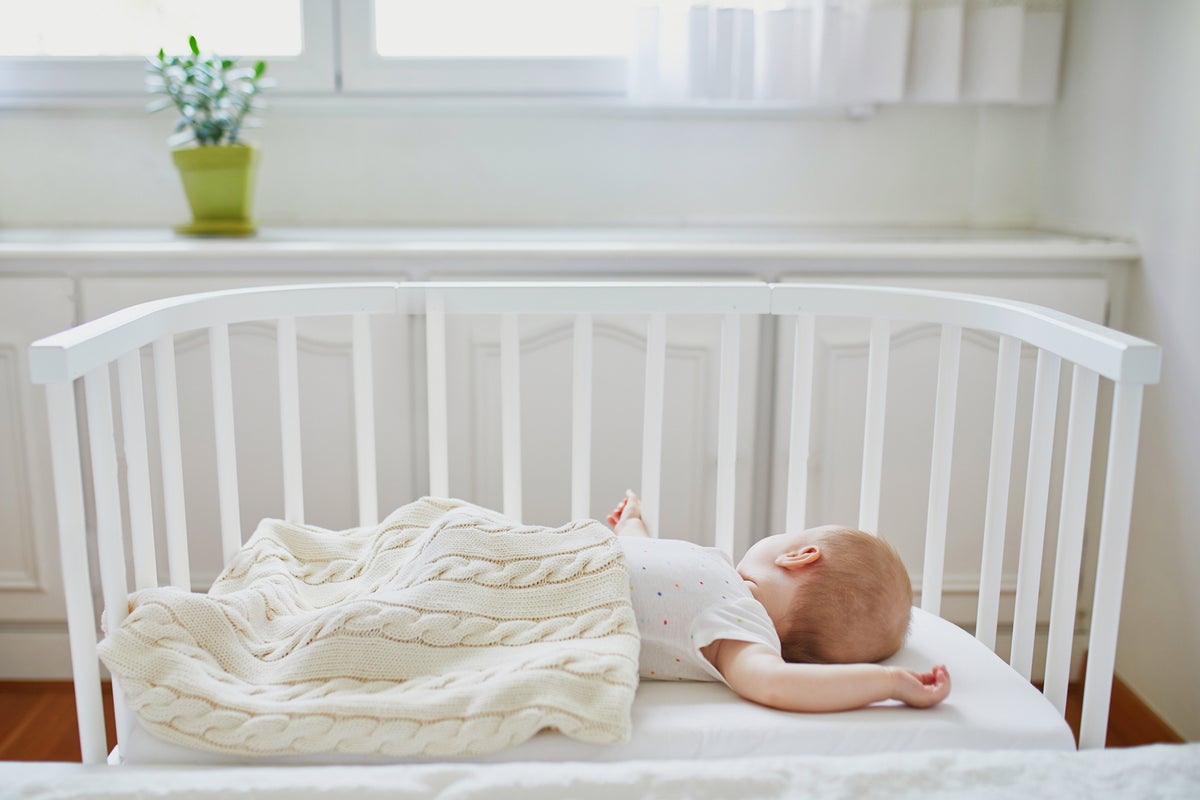Coroner calls for baby monitor change after child died because volume was turned down