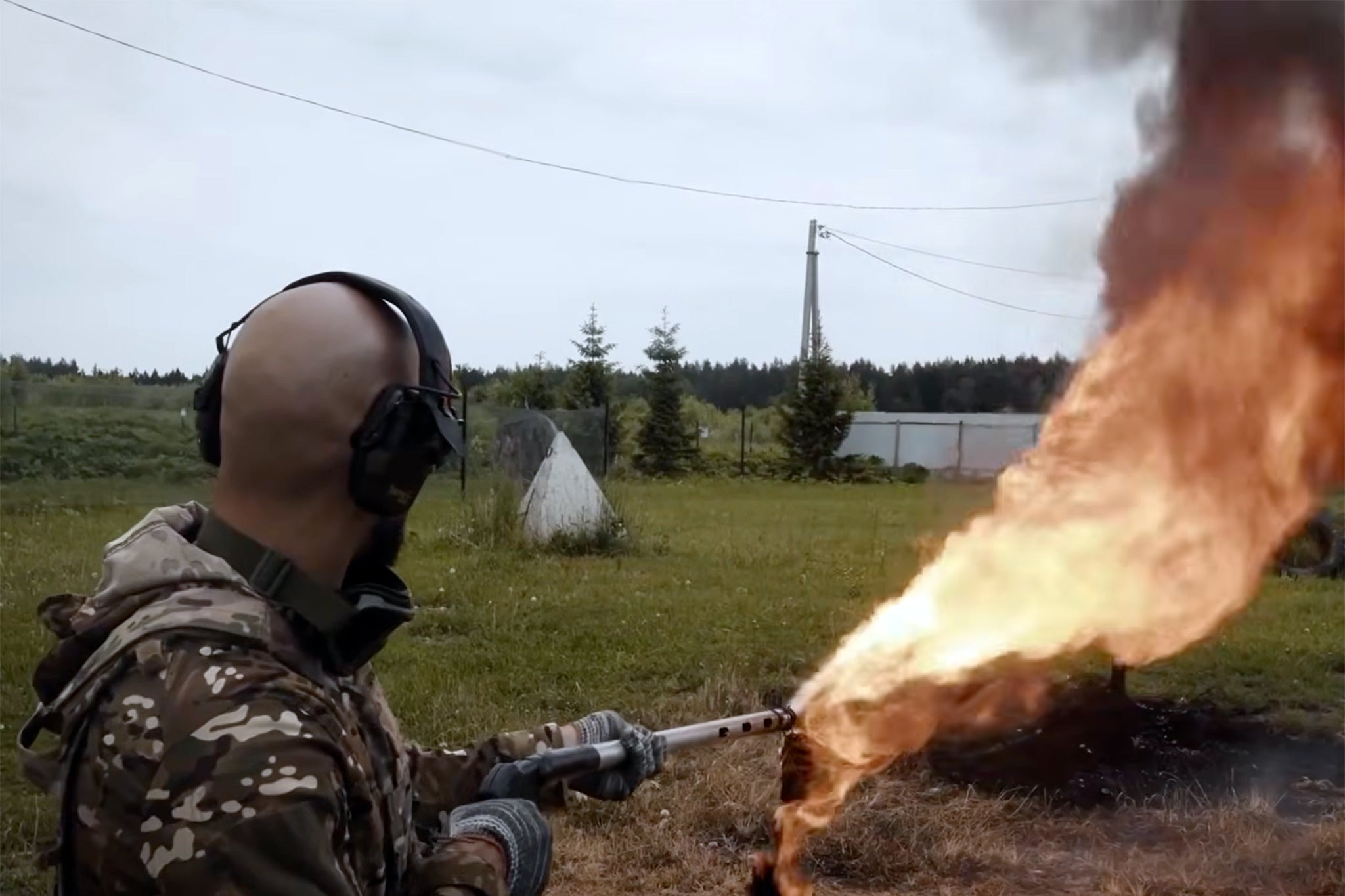 Andrew Tate seen with a flamethrower
