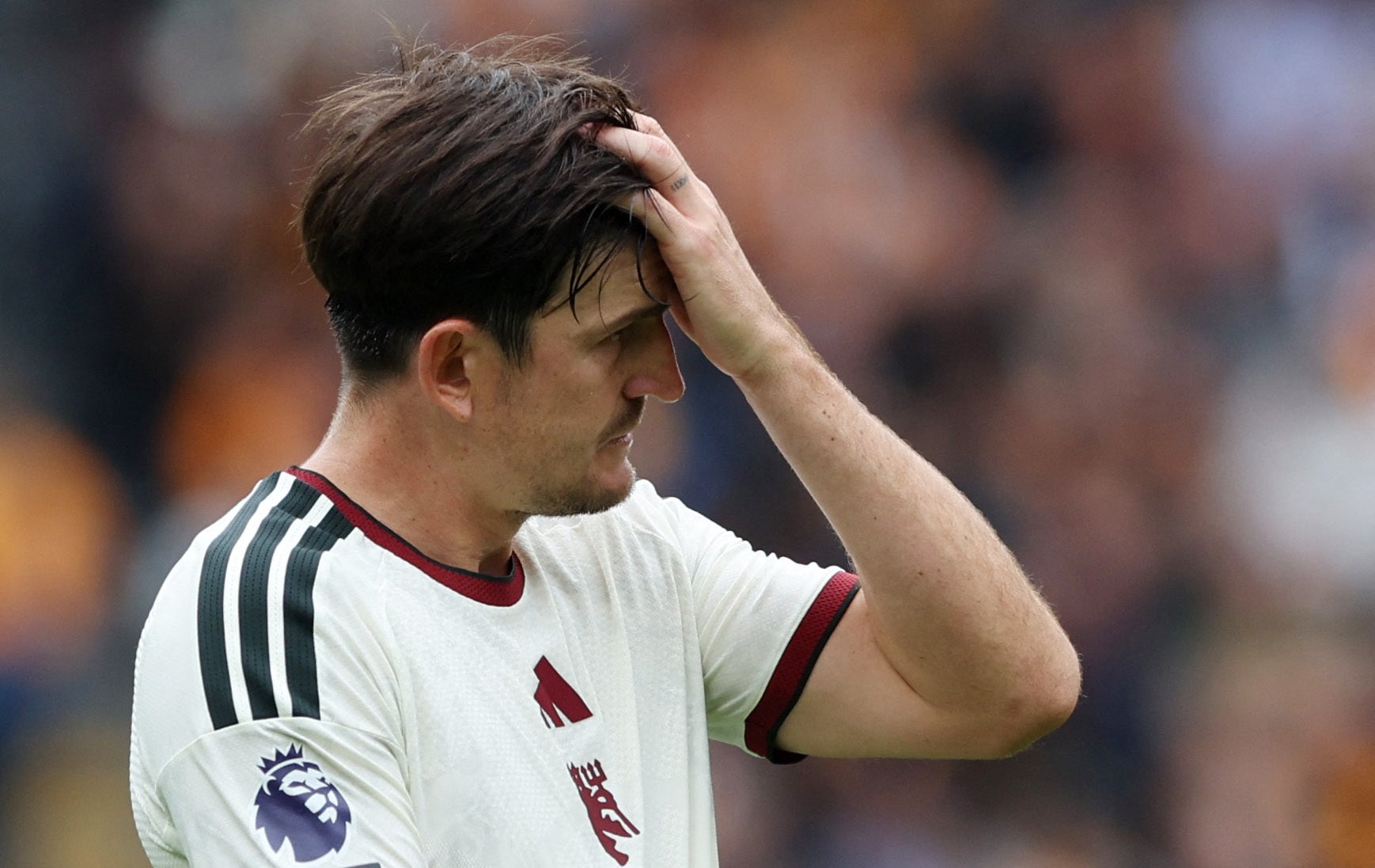Manchester United’s Harry Maguire reacts to defeat