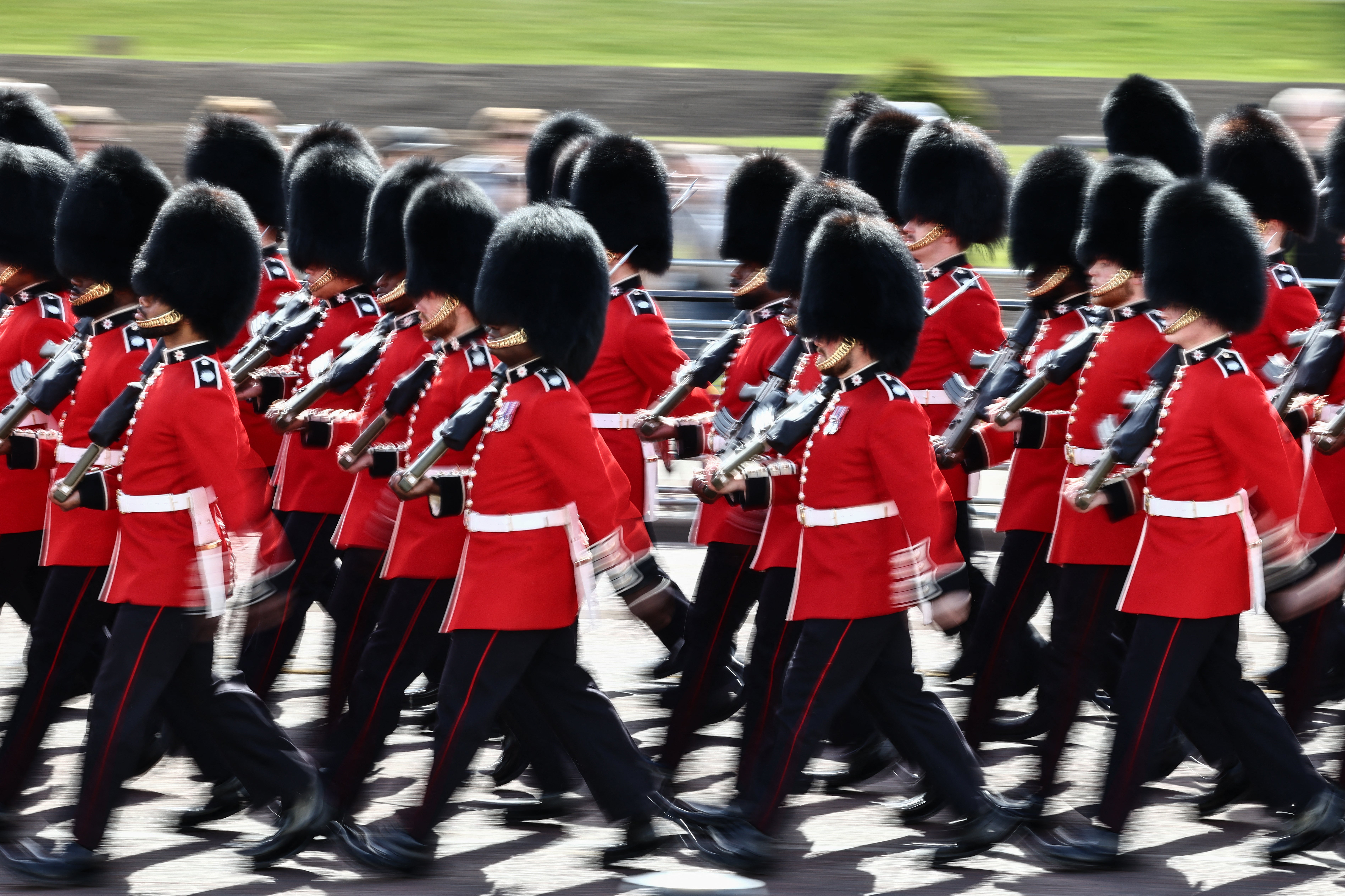 The Coldstream Guards parade during the state opening of Parliament in London on 13 May