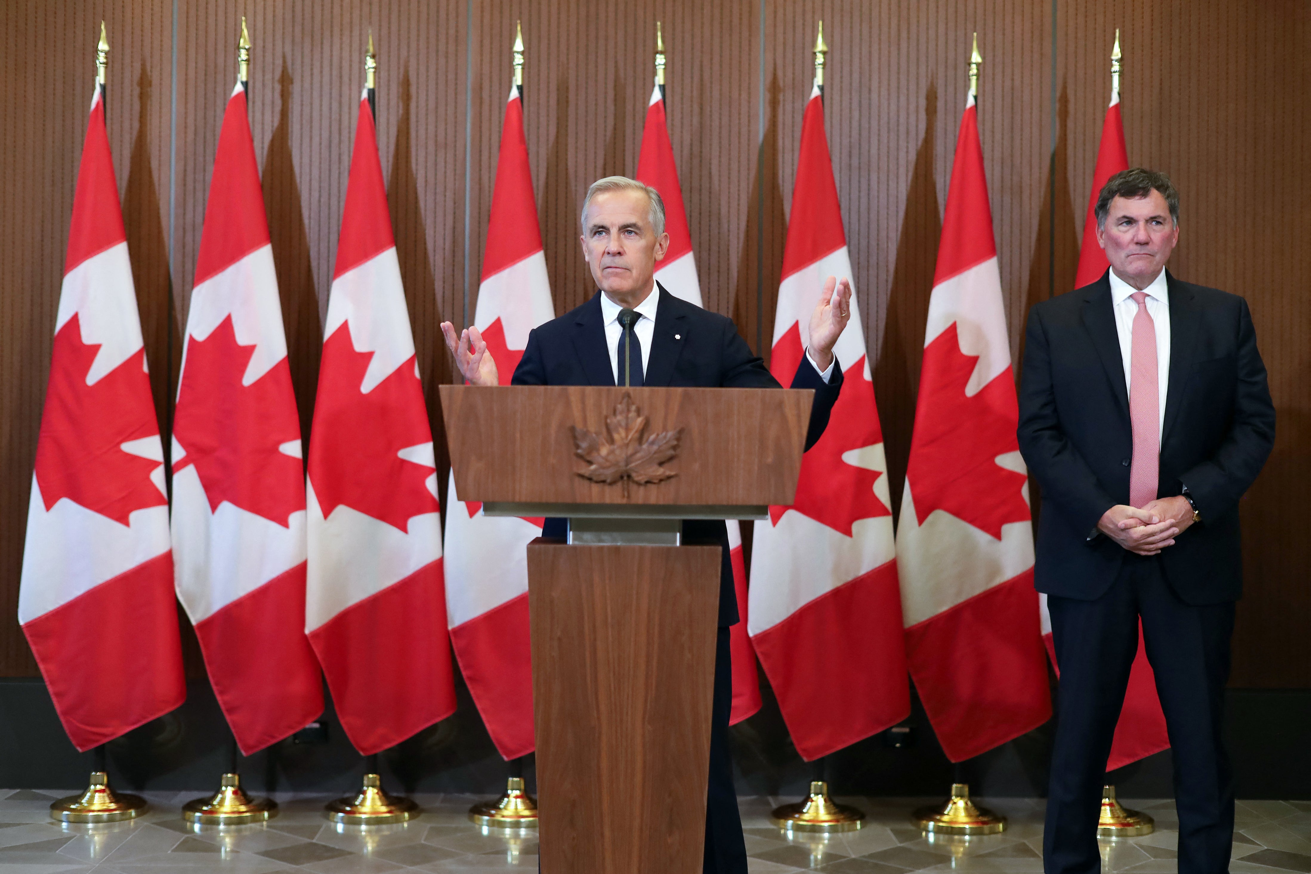 Canadian Prime Minister Mark Carney speaks at a press conference after trade talks with the US collapsed