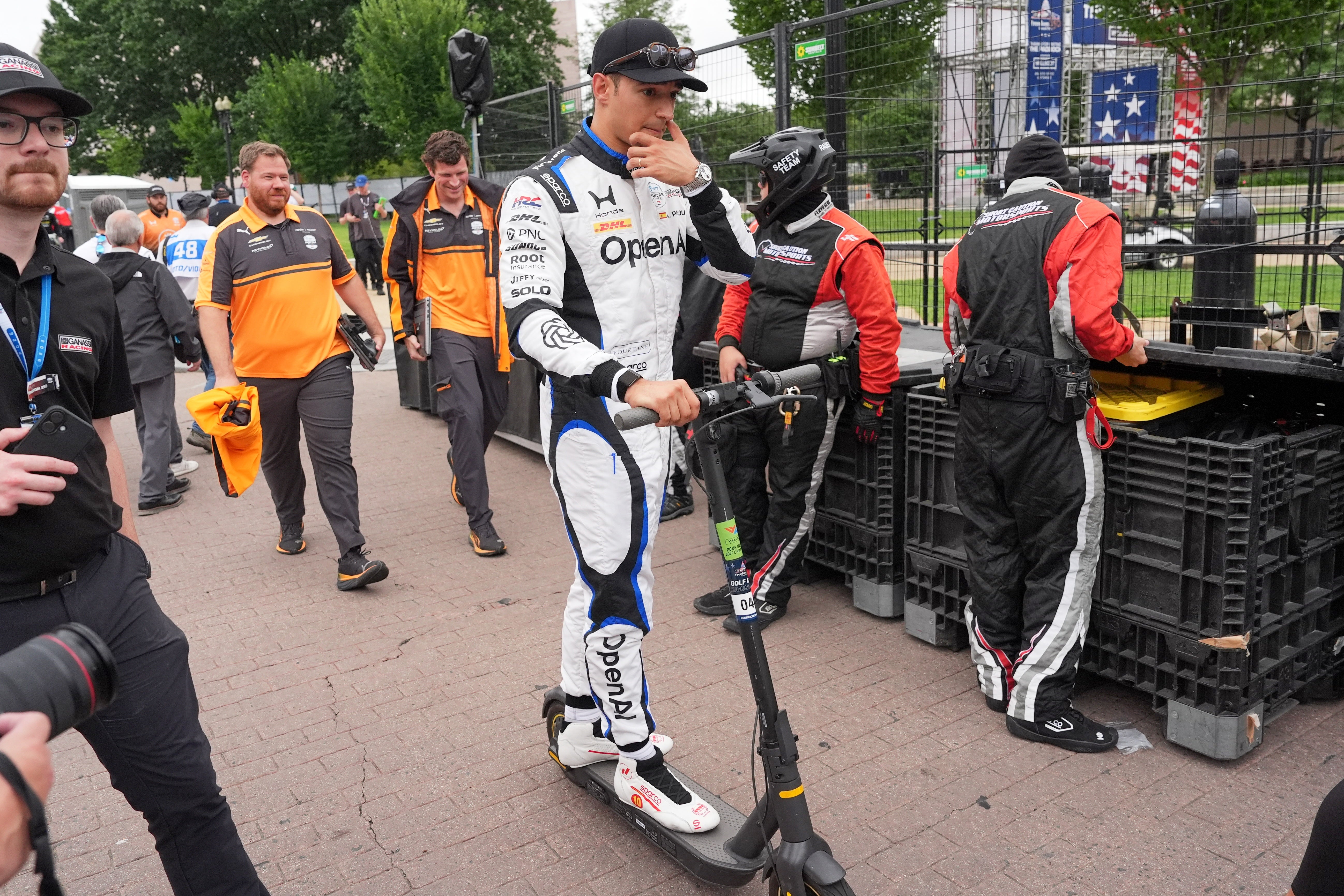 Alex Palou, pictured riding a scooter at the Freedom 250 Grand Prix track, described the circuit as ‘very bumpy’