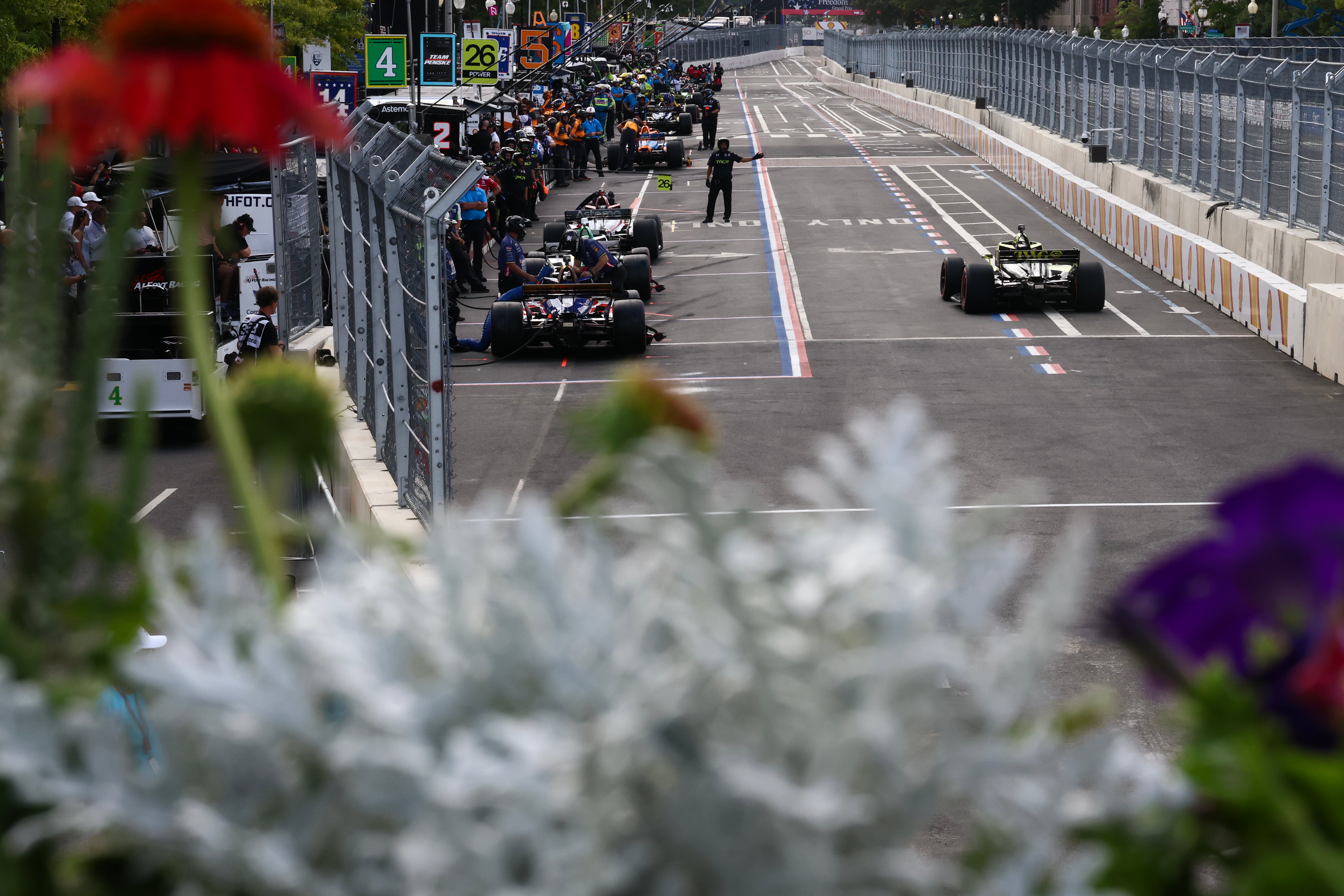 Will Power, driver of the #26 TWG AI Andretti Global Honda pulls in for a pit stop