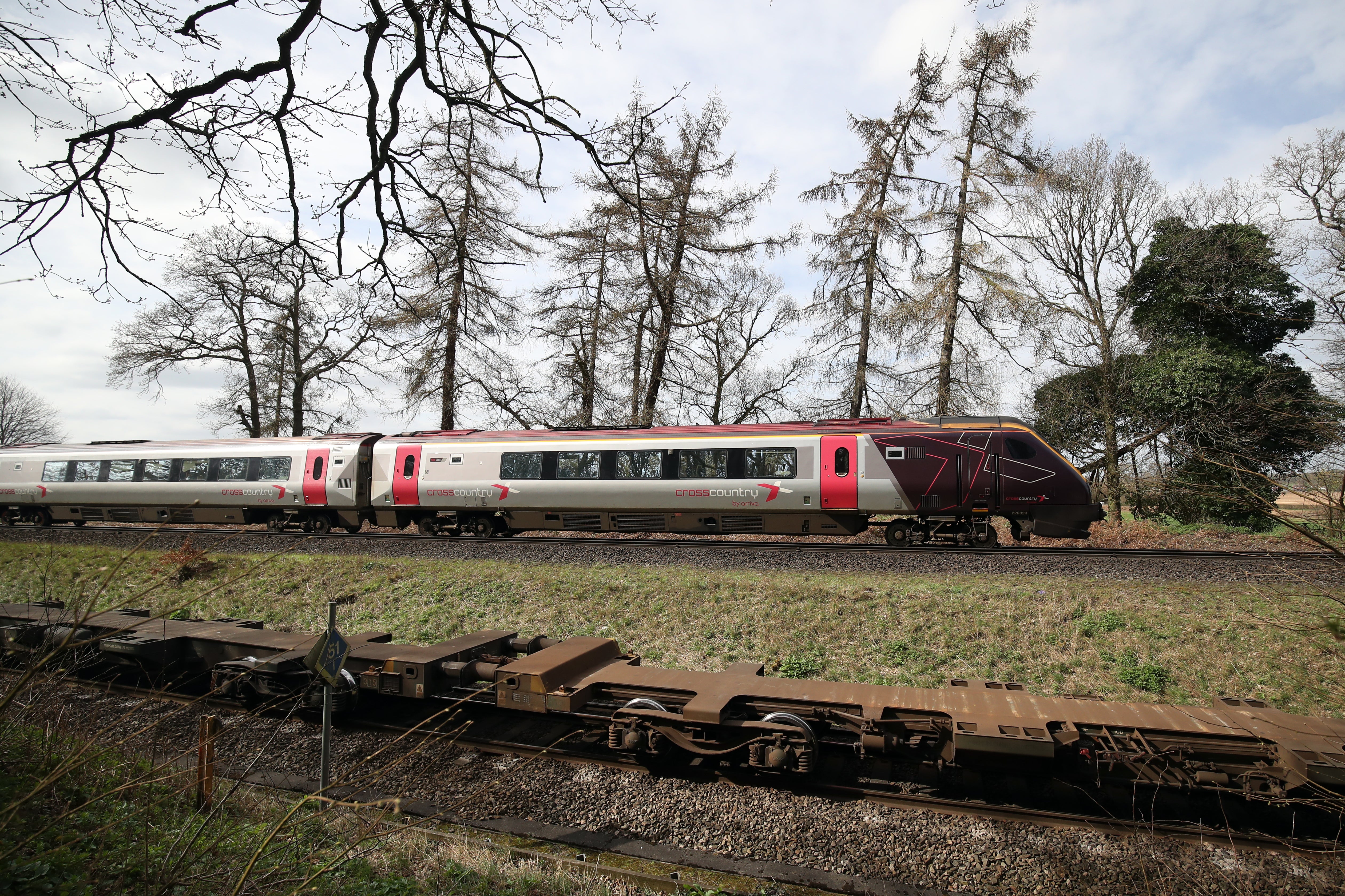 A CrossCountry train on the line near to Basingstoke in Hampshire (PA)