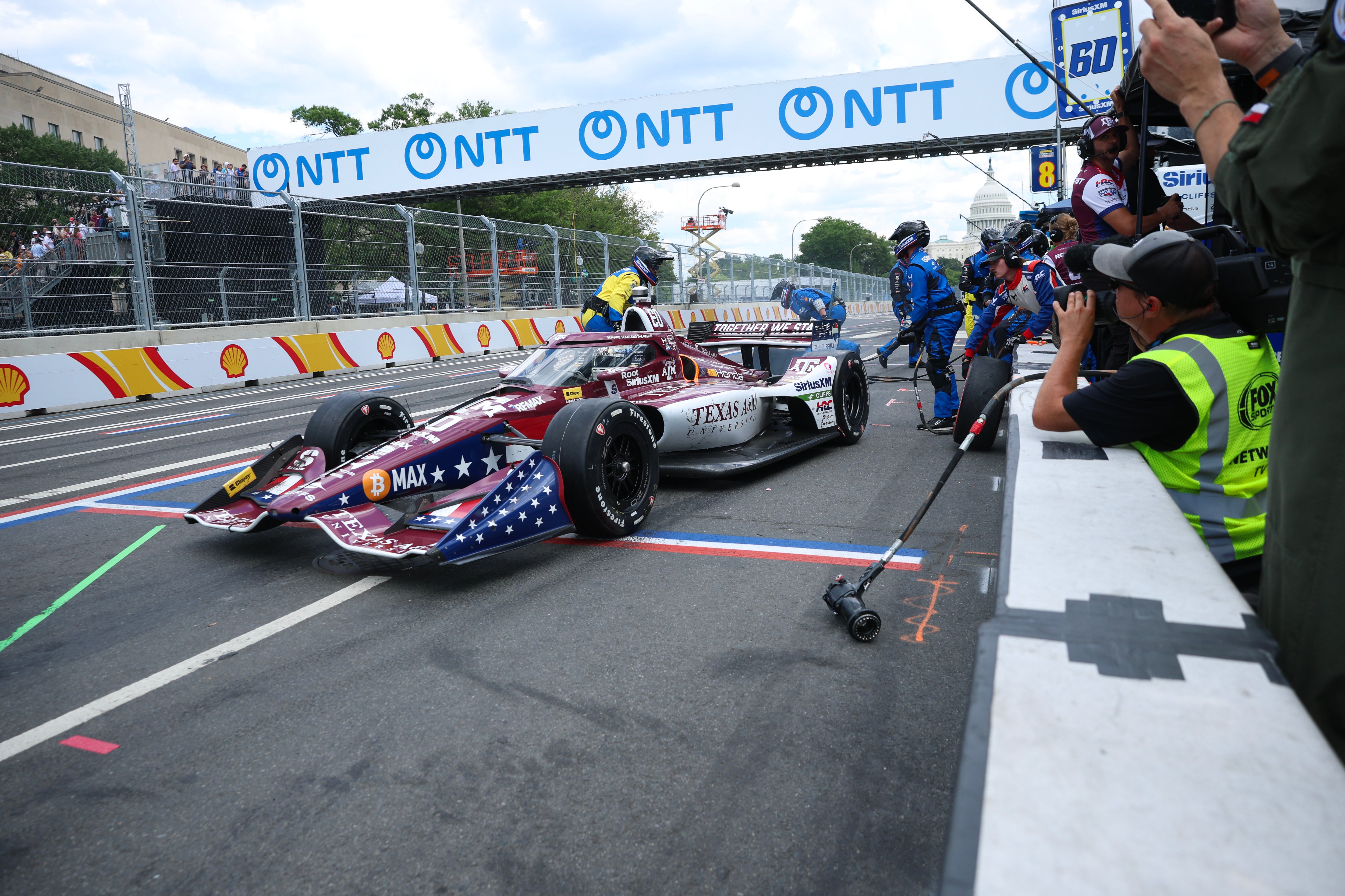 Pit crews with Felix Rosenqvist, driver of the #60 Meyer Shank
