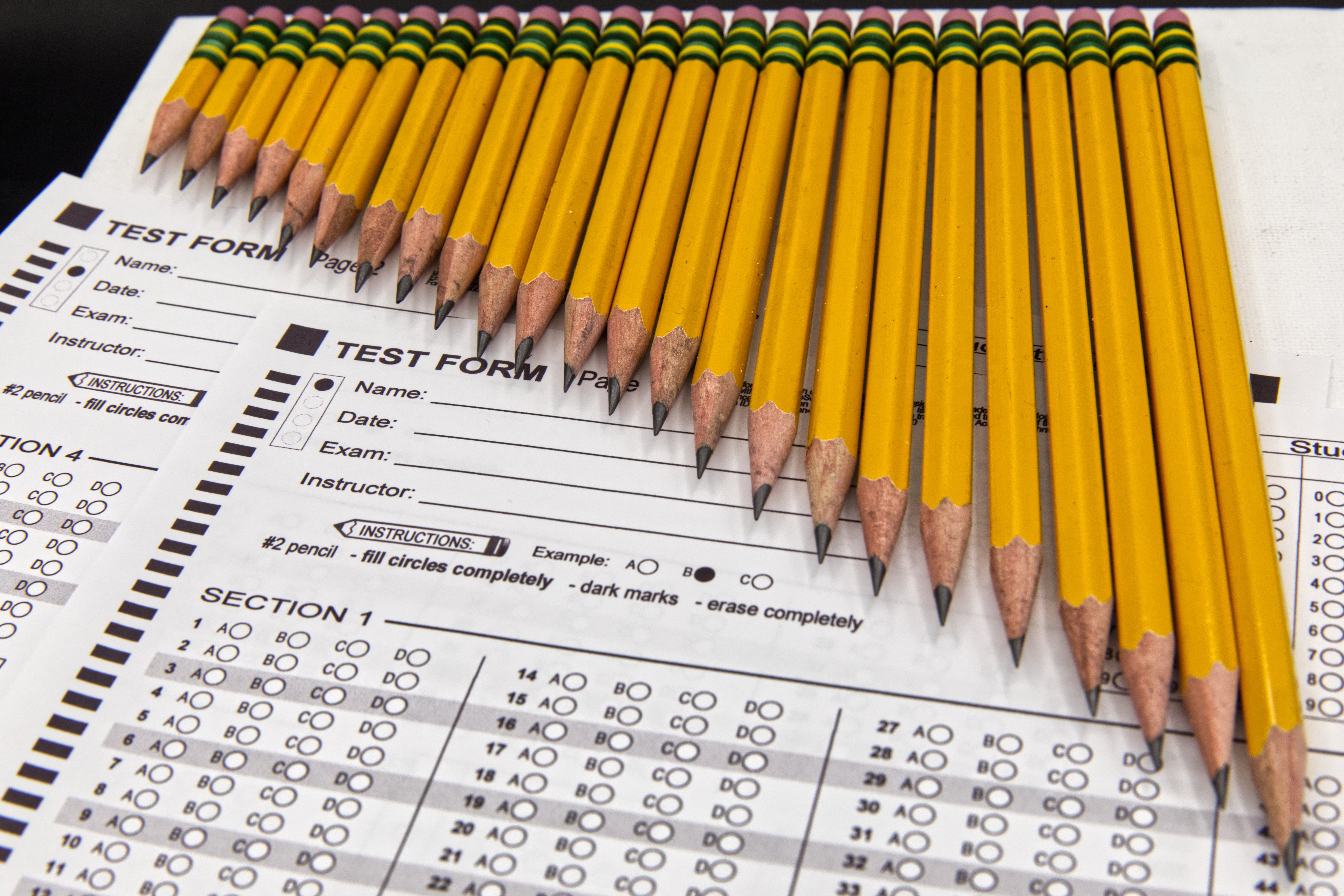 For decades, clammy hands clutched the ridged yellow wood on exam day