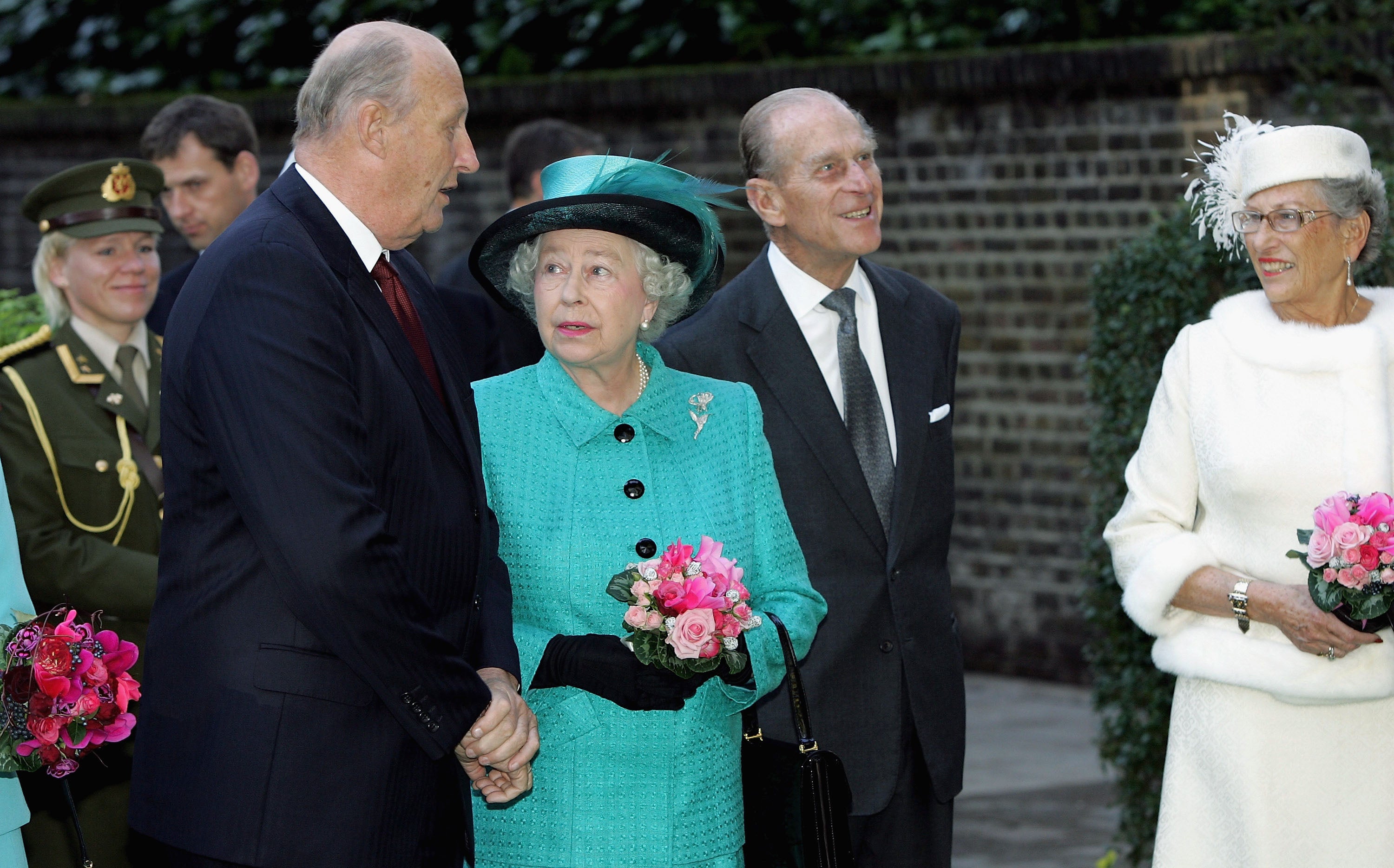 (L-R) King Harald, Her Majesty Queen Elizabeth II and The Duke Of Edinburgh arrive at the Norwegian Ambassador's residence in London in 2005