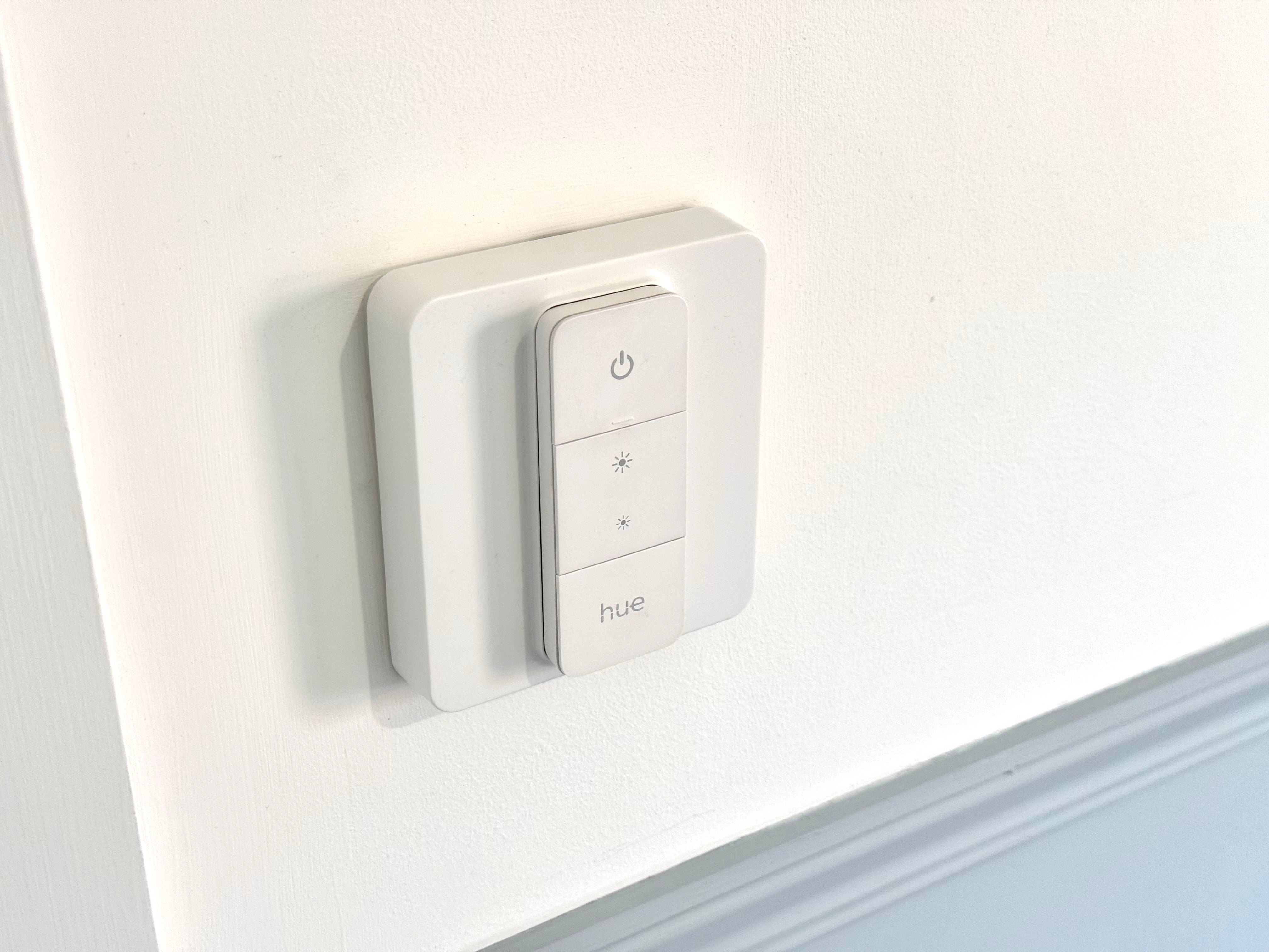 This adapter by Iyoki covers existing wall switches with a magnetic mount for Hue dimmer switches. (The Independent / Alistair Charlton)